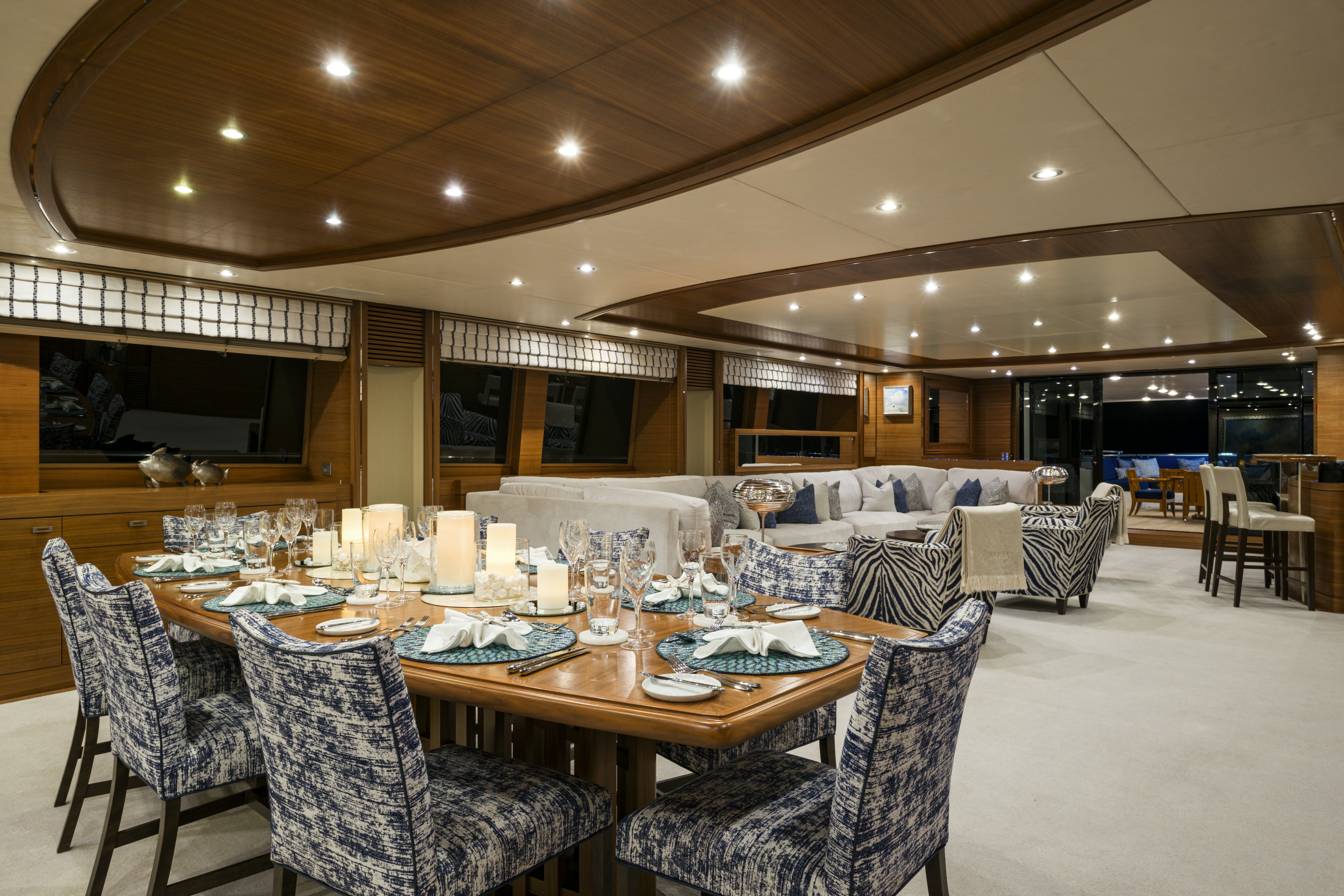a large dining room with a large table and chairs aboard BALISTA Yacht for Sale