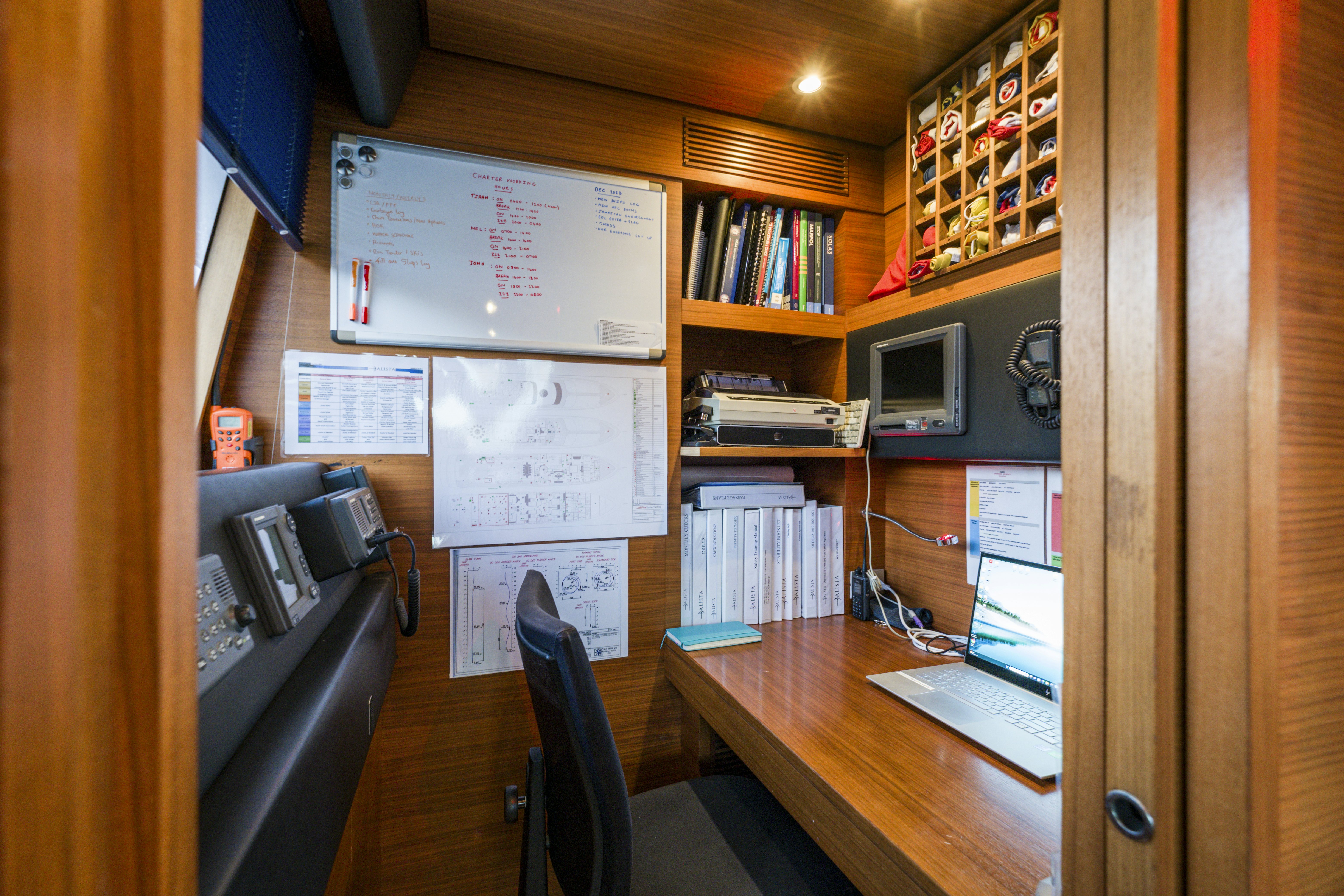a room with a desk and computer aboard BALISTA Yacht for Sale