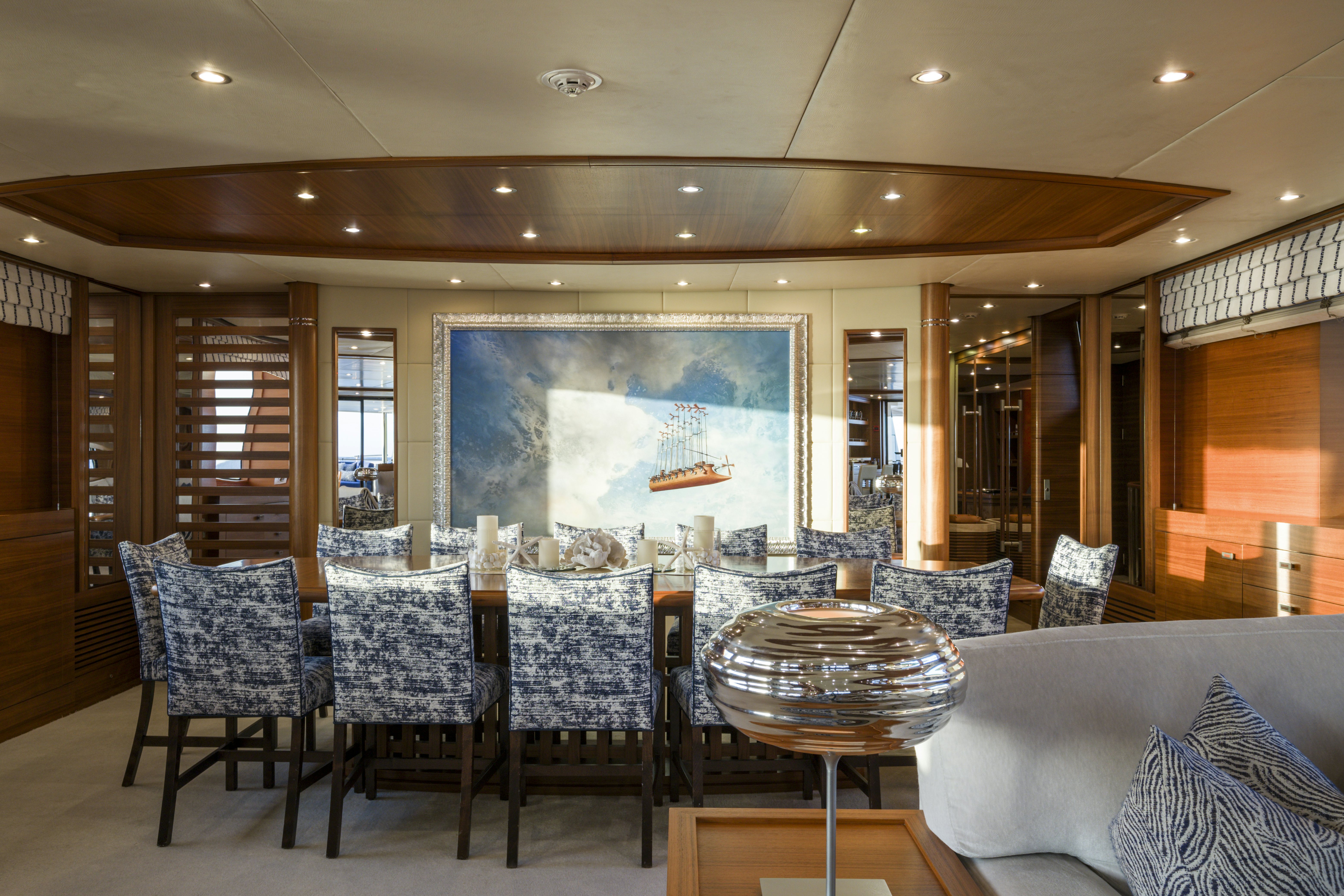 a large dining room with a large table and chairs aboard BALISTA Yacht for Sale