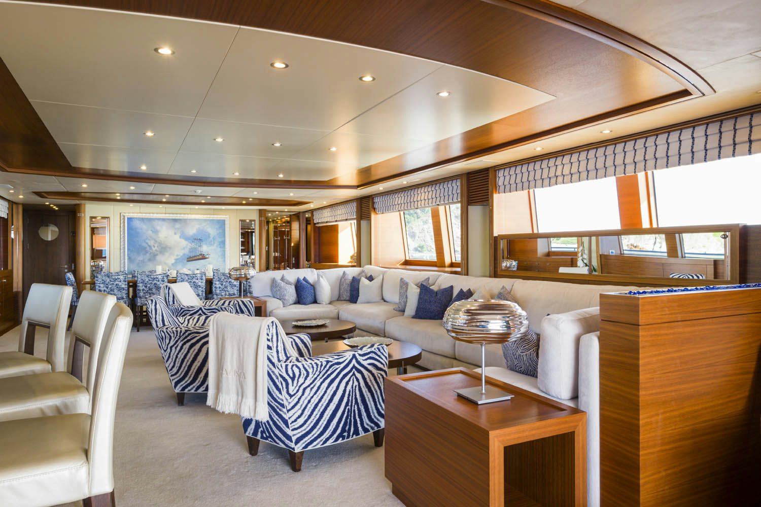 a large room with a couch and a table aboard BALISTA Yacht for Charter