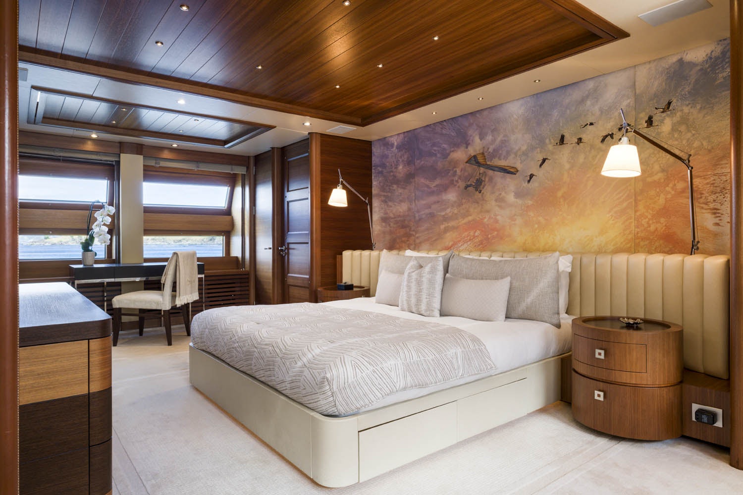 a large bed in a room aboard BALISTA Yacht for Charter