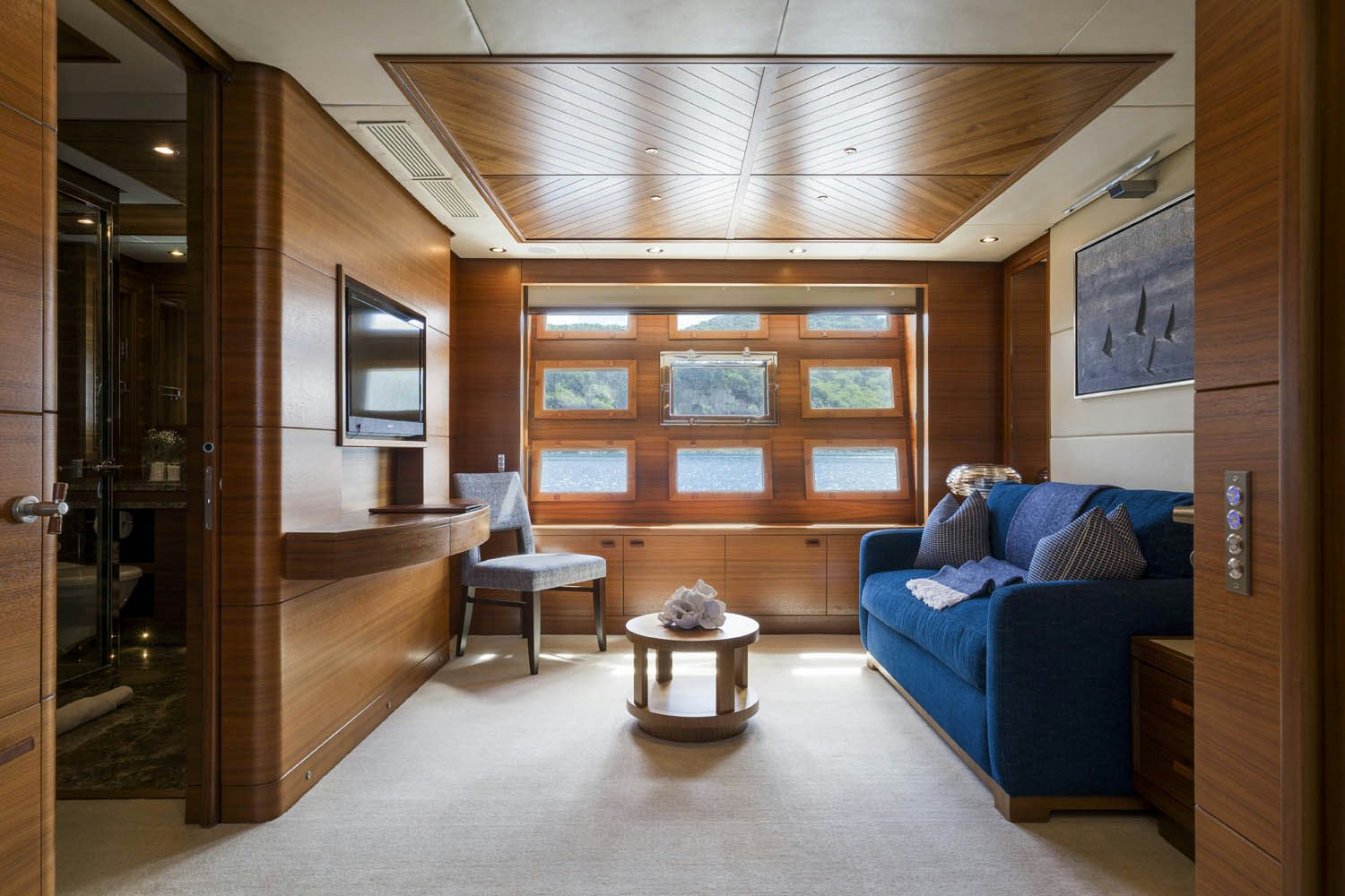 a room with a couch and a table aboard BALISTA Yacht for Charter