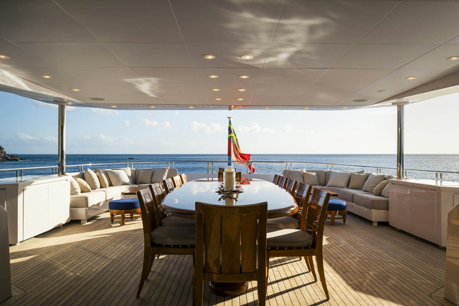 a room with a table and chairs aboard BALISTA Yacht for Charter