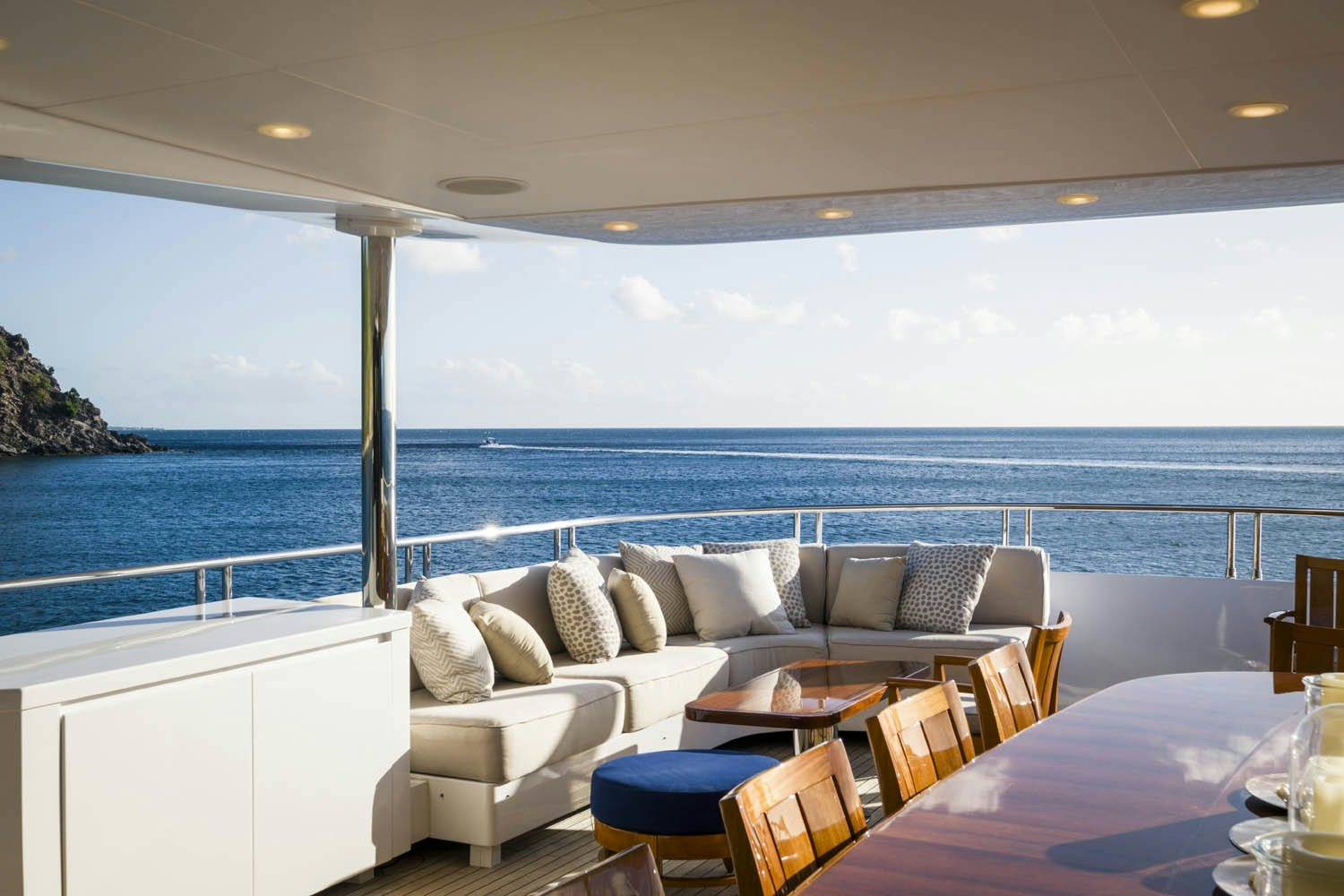 a living room with a large body of water aboard BALISTA Yacht for Charter