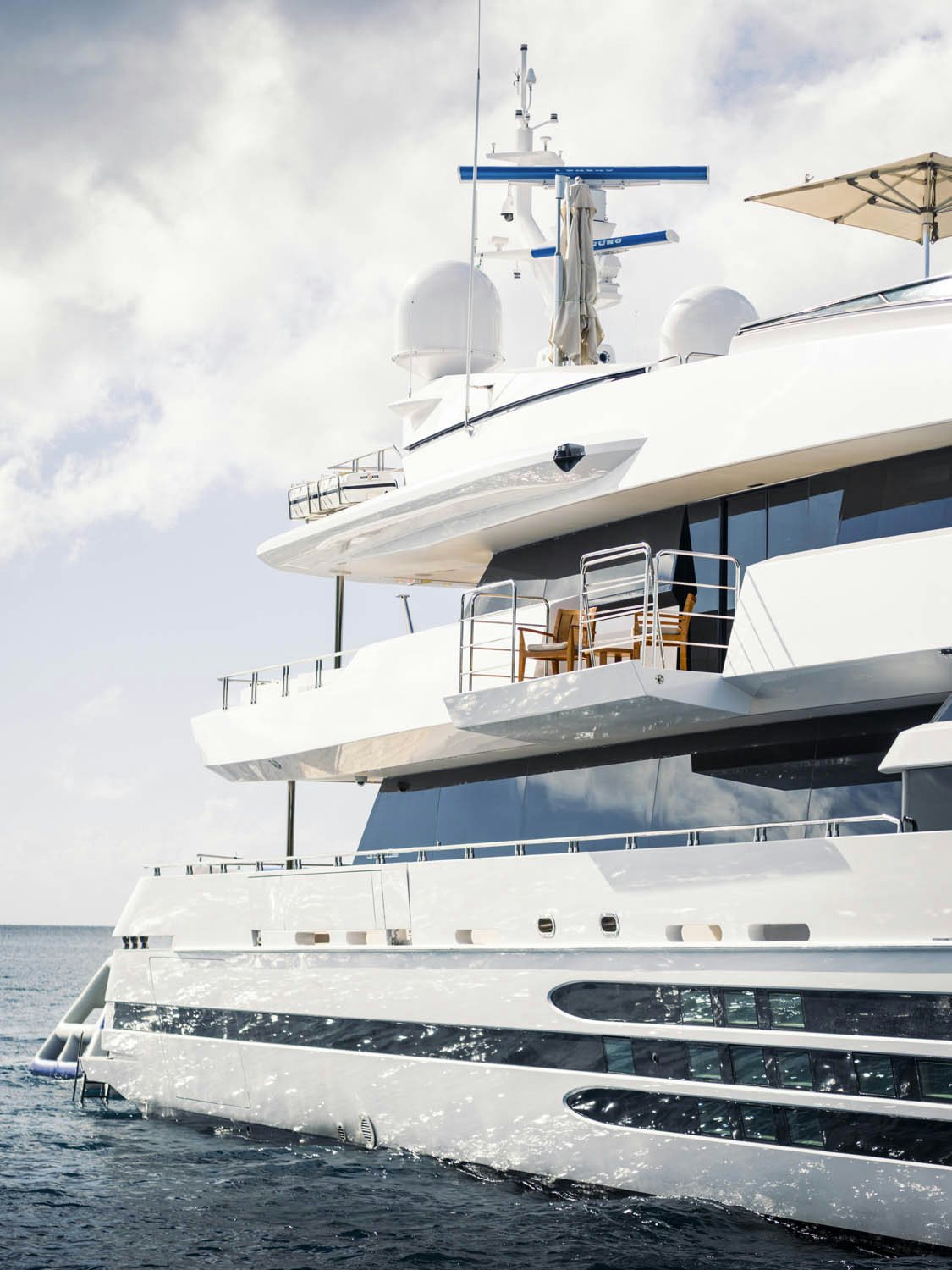 a white boat on the water aboard BALISTA Yacht for Charter