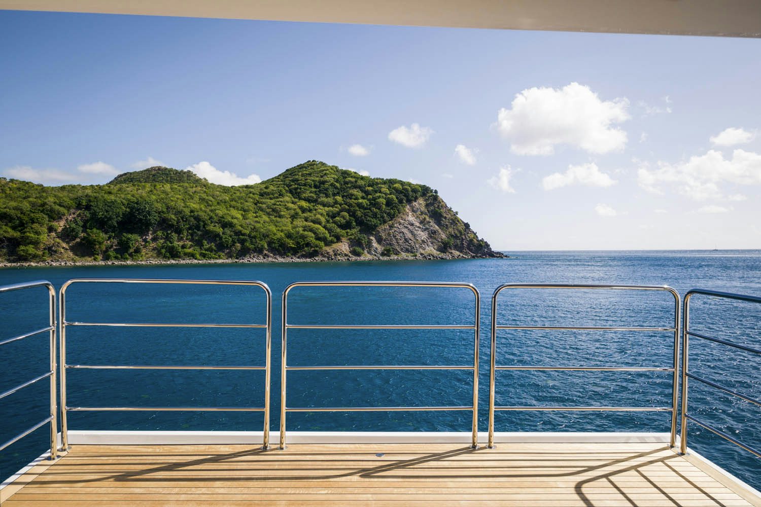 a railing over a body of water aboard BALISTA Yacht for Charter