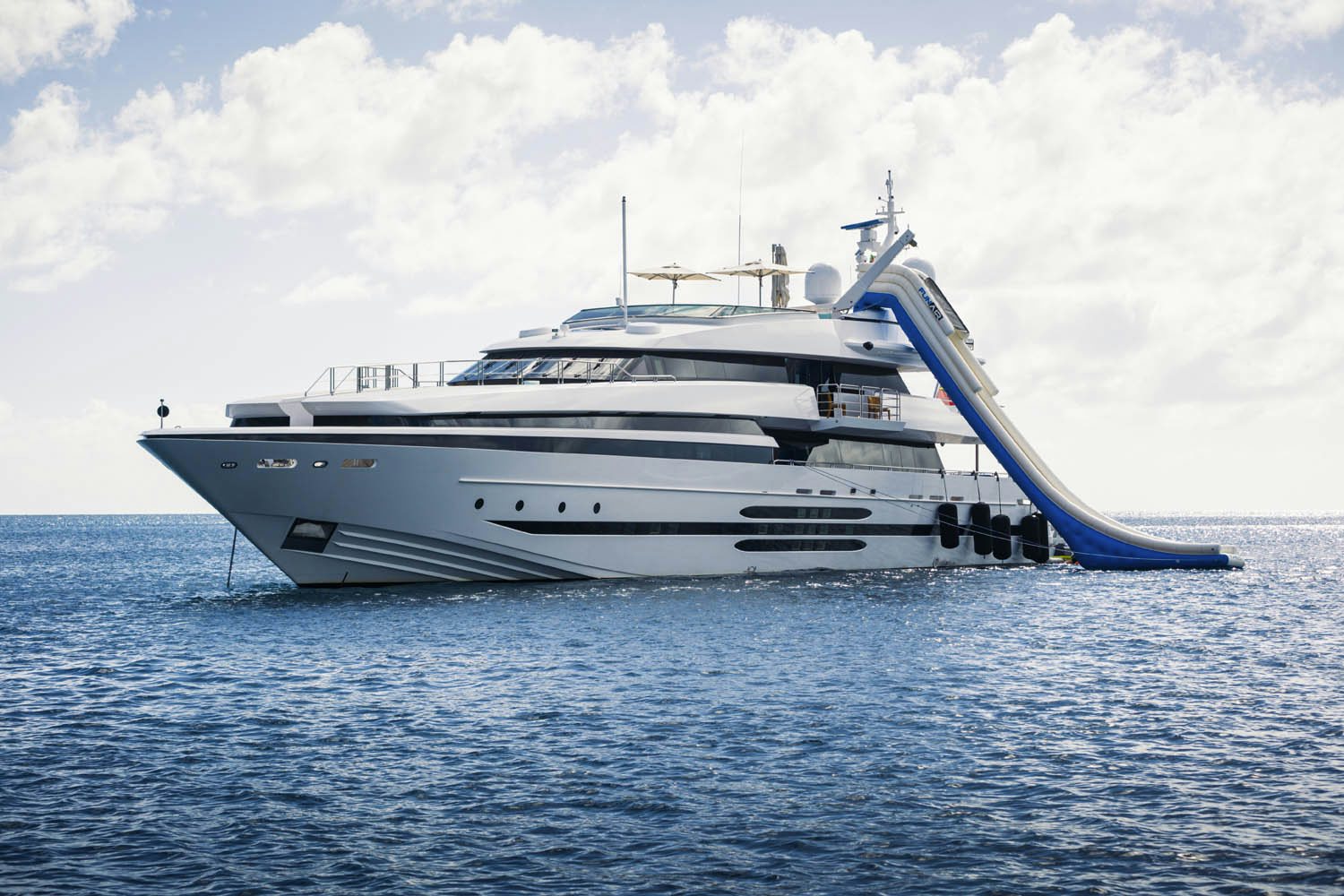 a large white yacht in the water aboard BALISTA Yacht for Charter