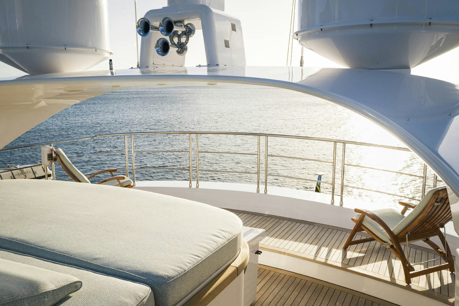 a large pool with a large white wall and a white mat aboard BALISTA Yacht for Charter