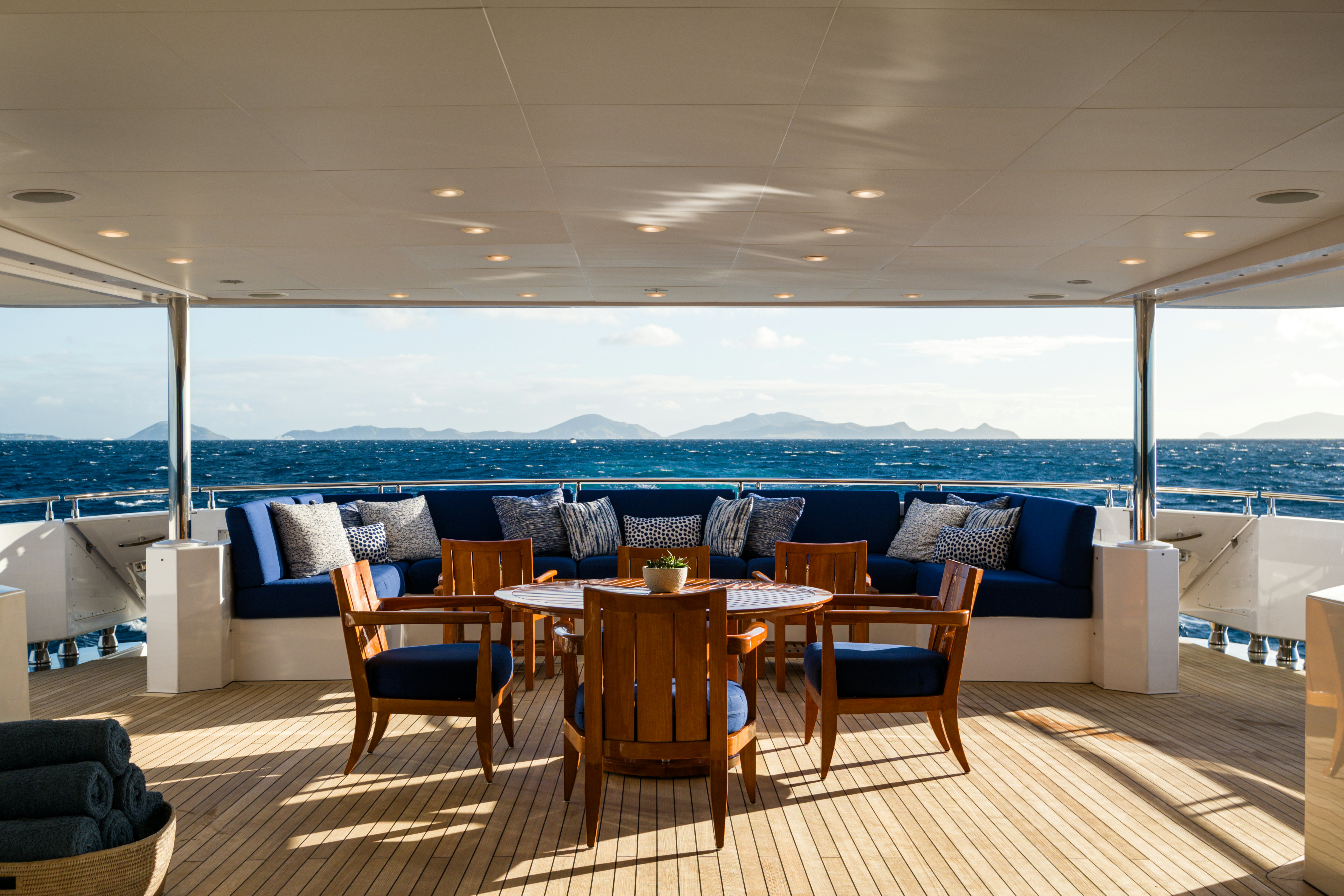 a room with a table and chairs aboard BALISTA Yacht for Sale