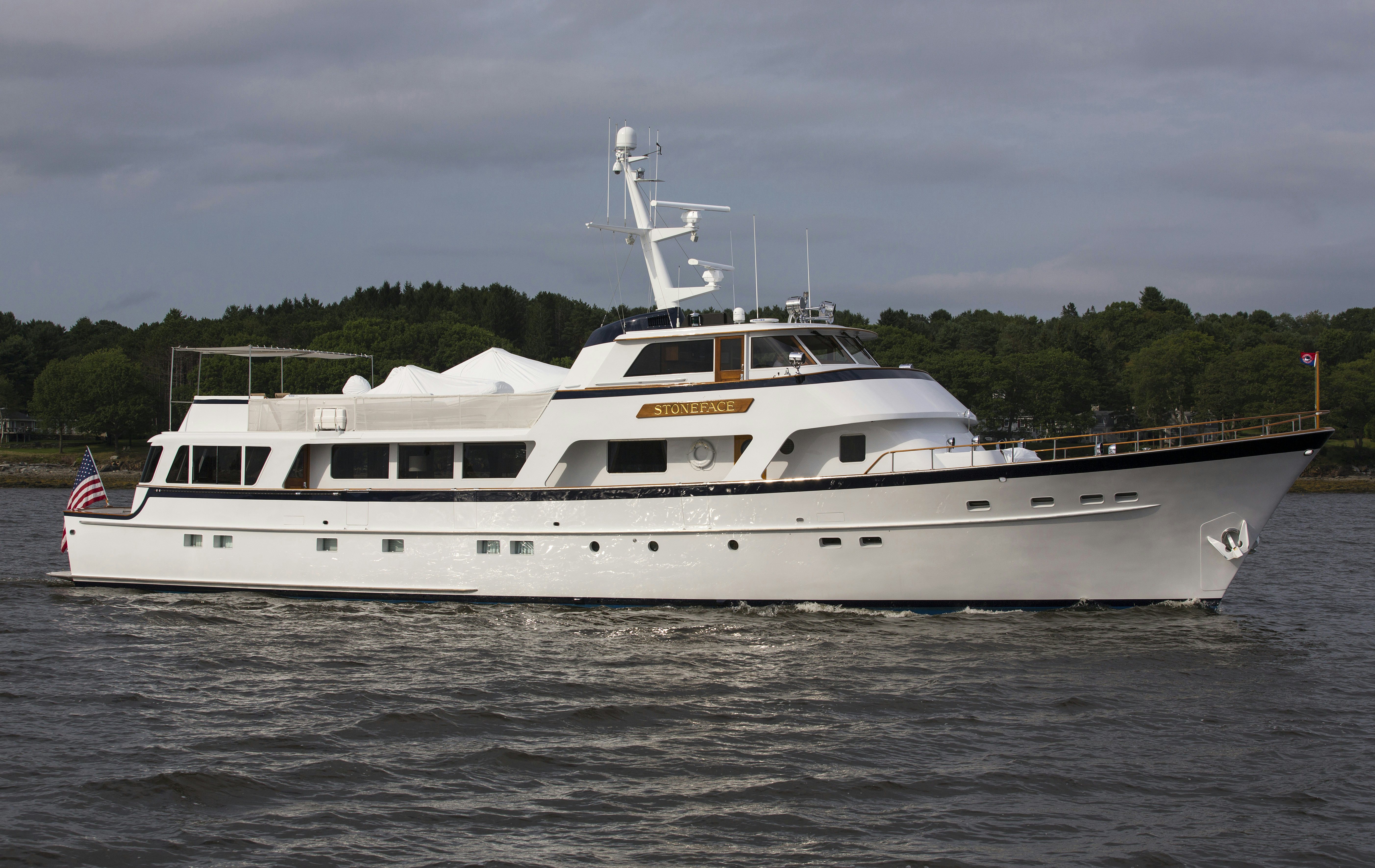 a large white boat in the water aboard STONEFACE Yacht for Sale