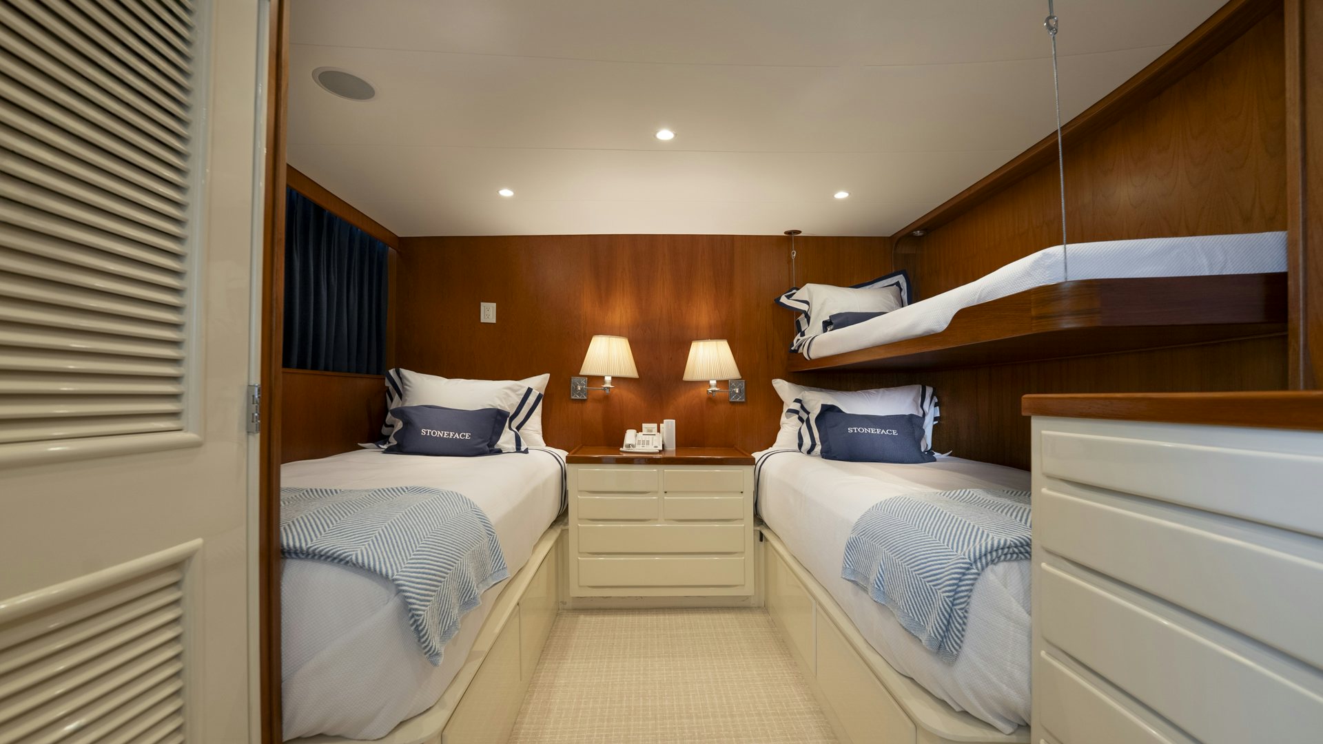 a room with two beds aboard STONEFACE Yacht for Sale