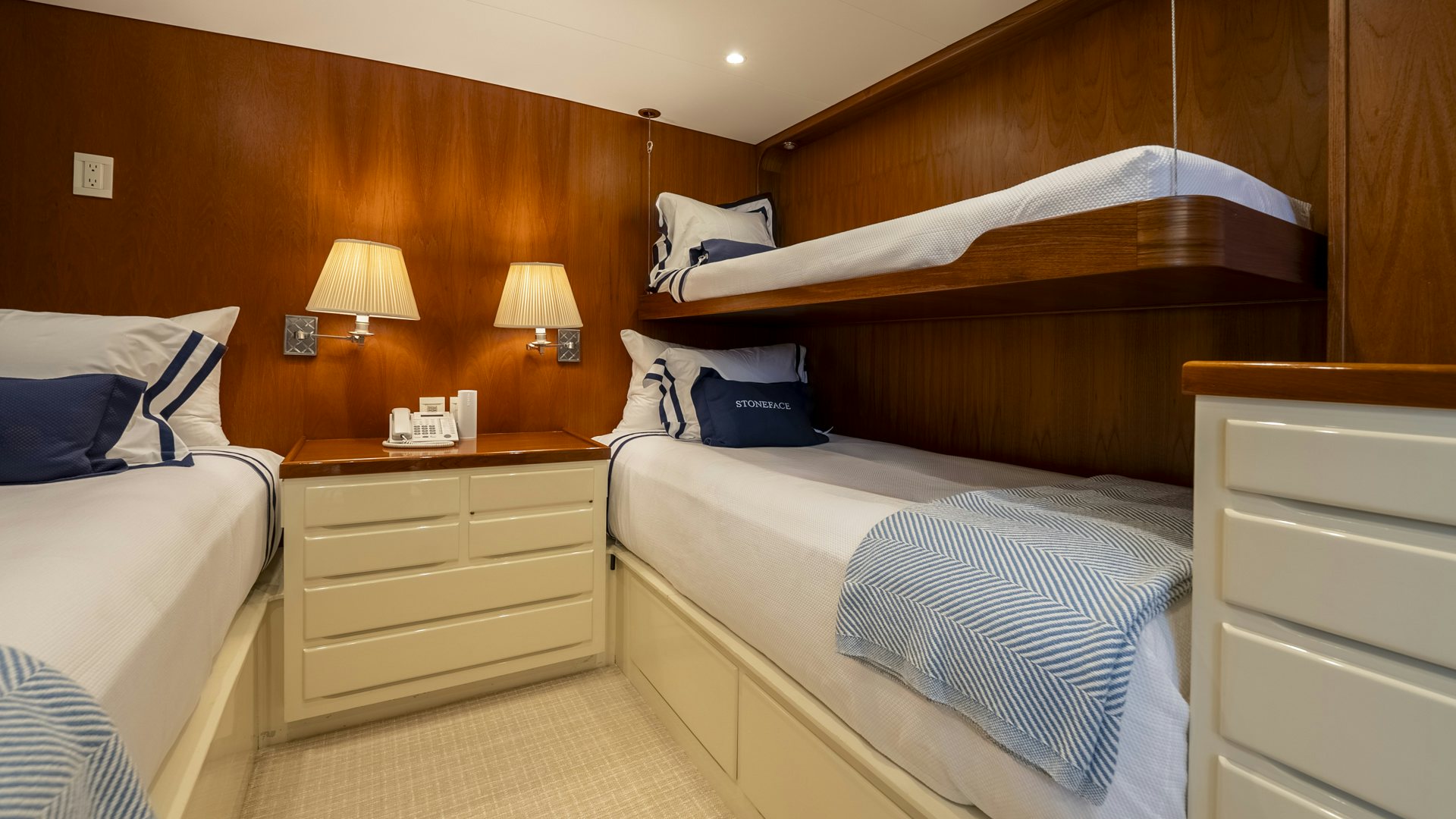 a room with two beds aboard STONEFACE Yacht for Sale