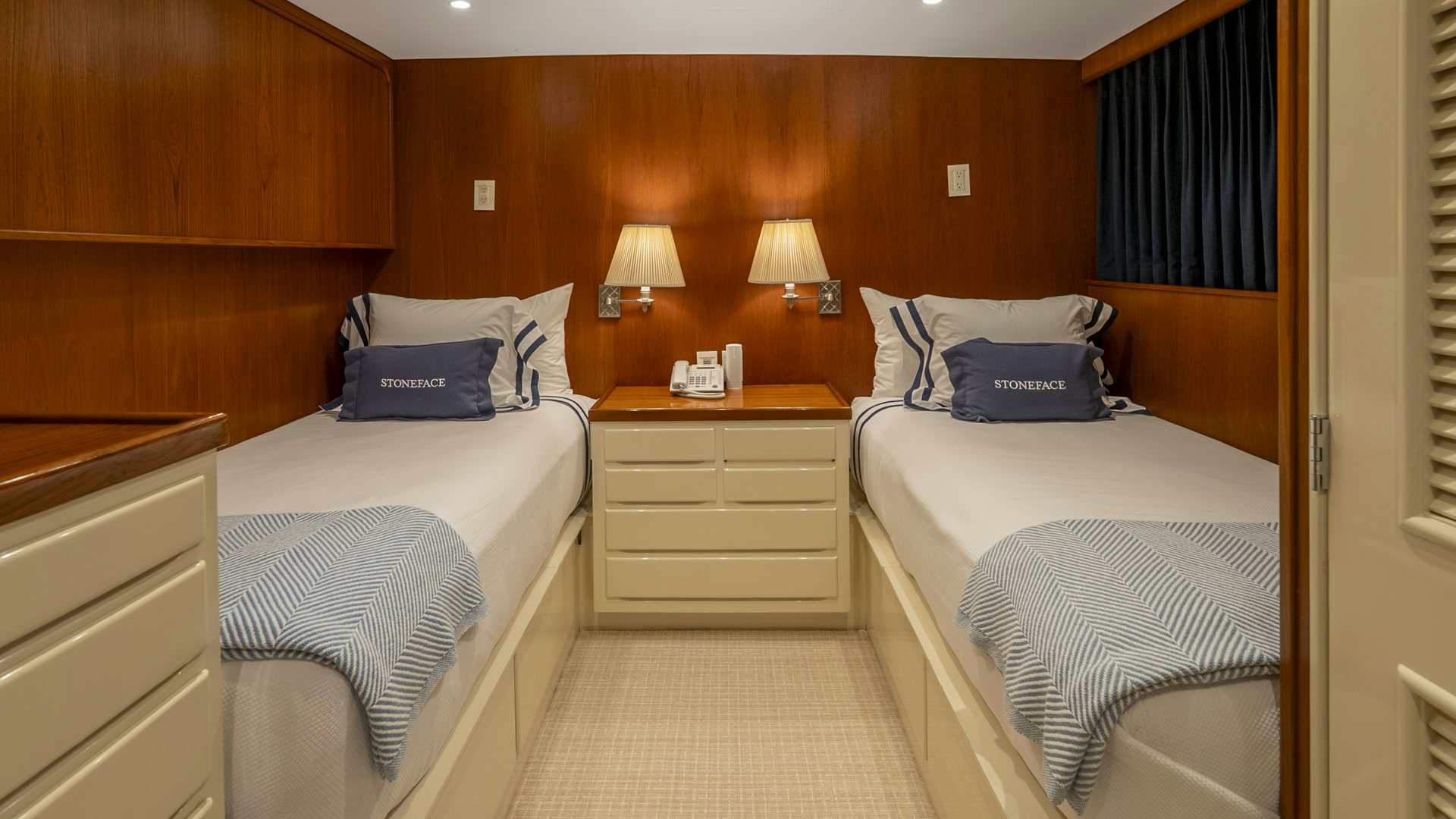 a room with two beds aboard STONEFACE Yacht for Sale