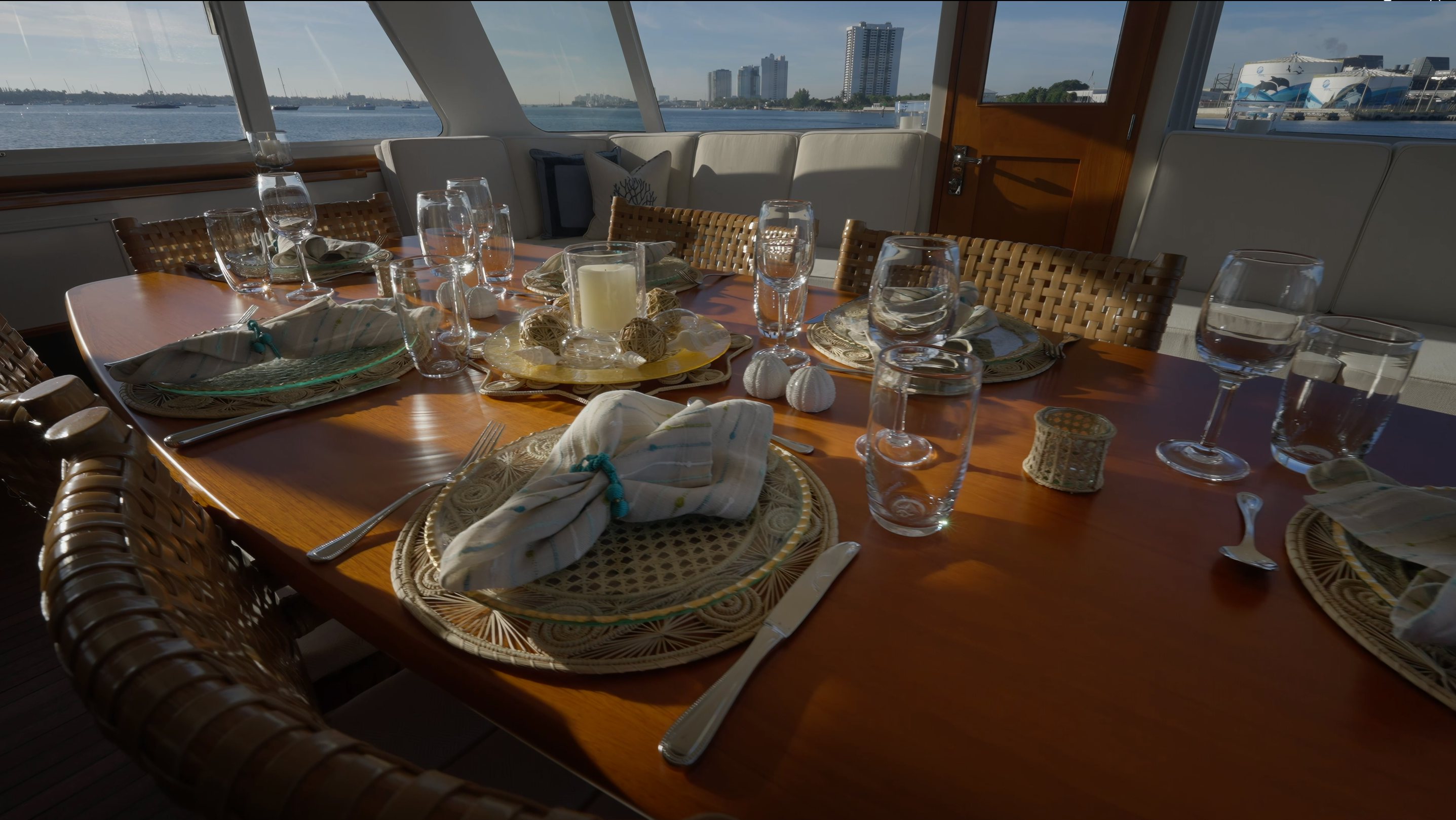 a table with plates and glasses aboard STONEFACE Yacht for Sale