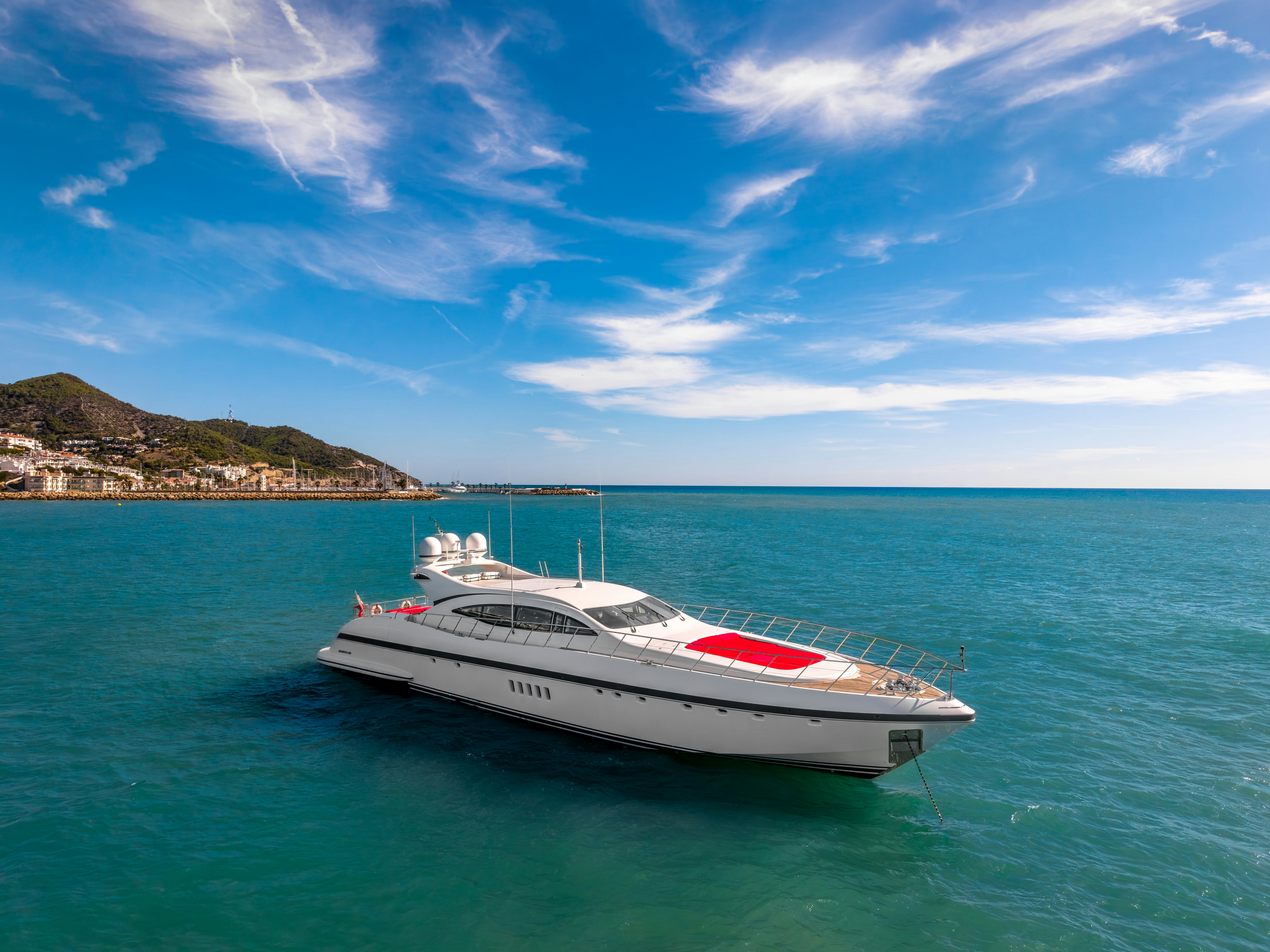 a white boat in the water aboard GRAZIADIU Yacht for Sale