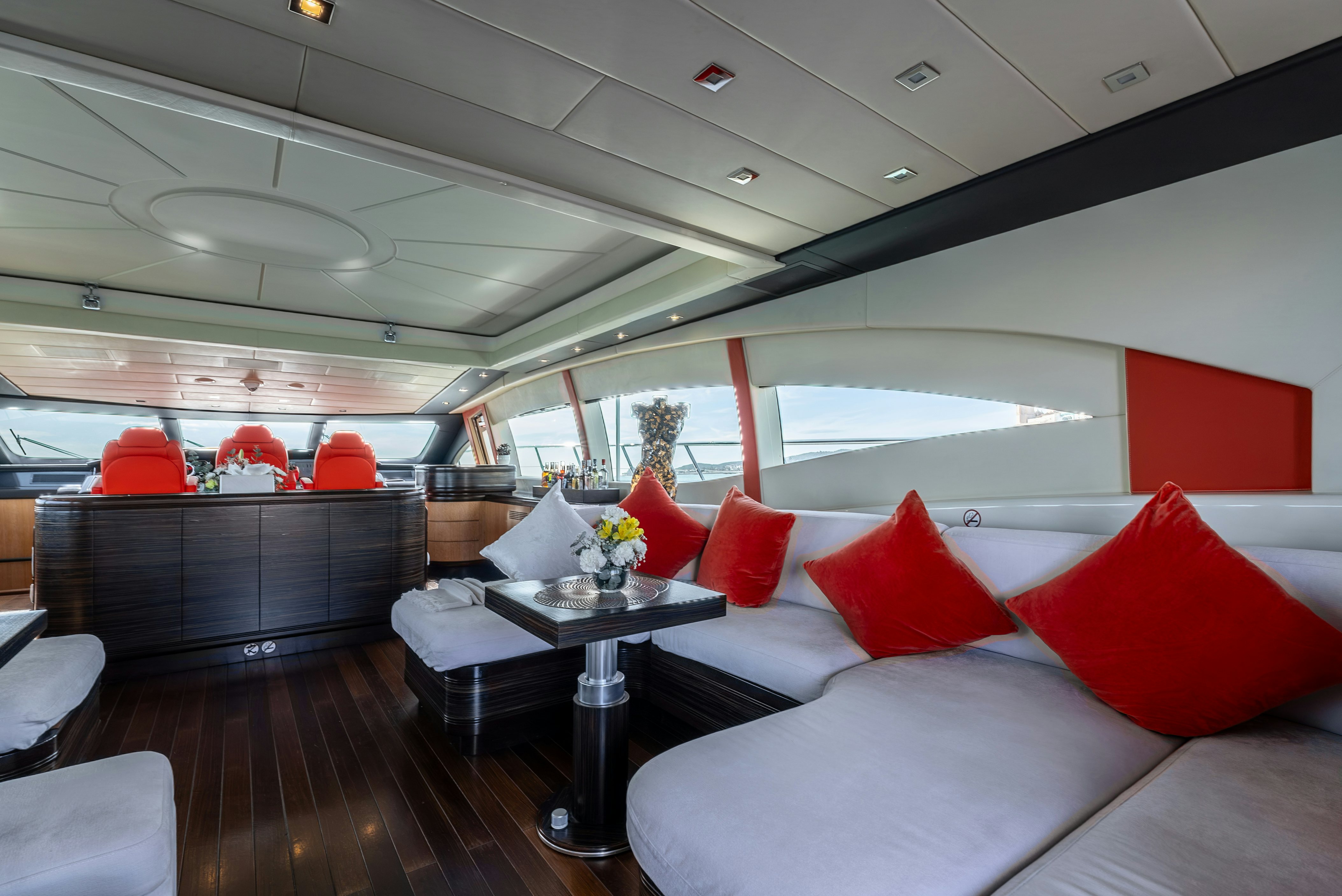 a room with a couch and a table and chairs aboard GRAZIADIU Yacht for Sale