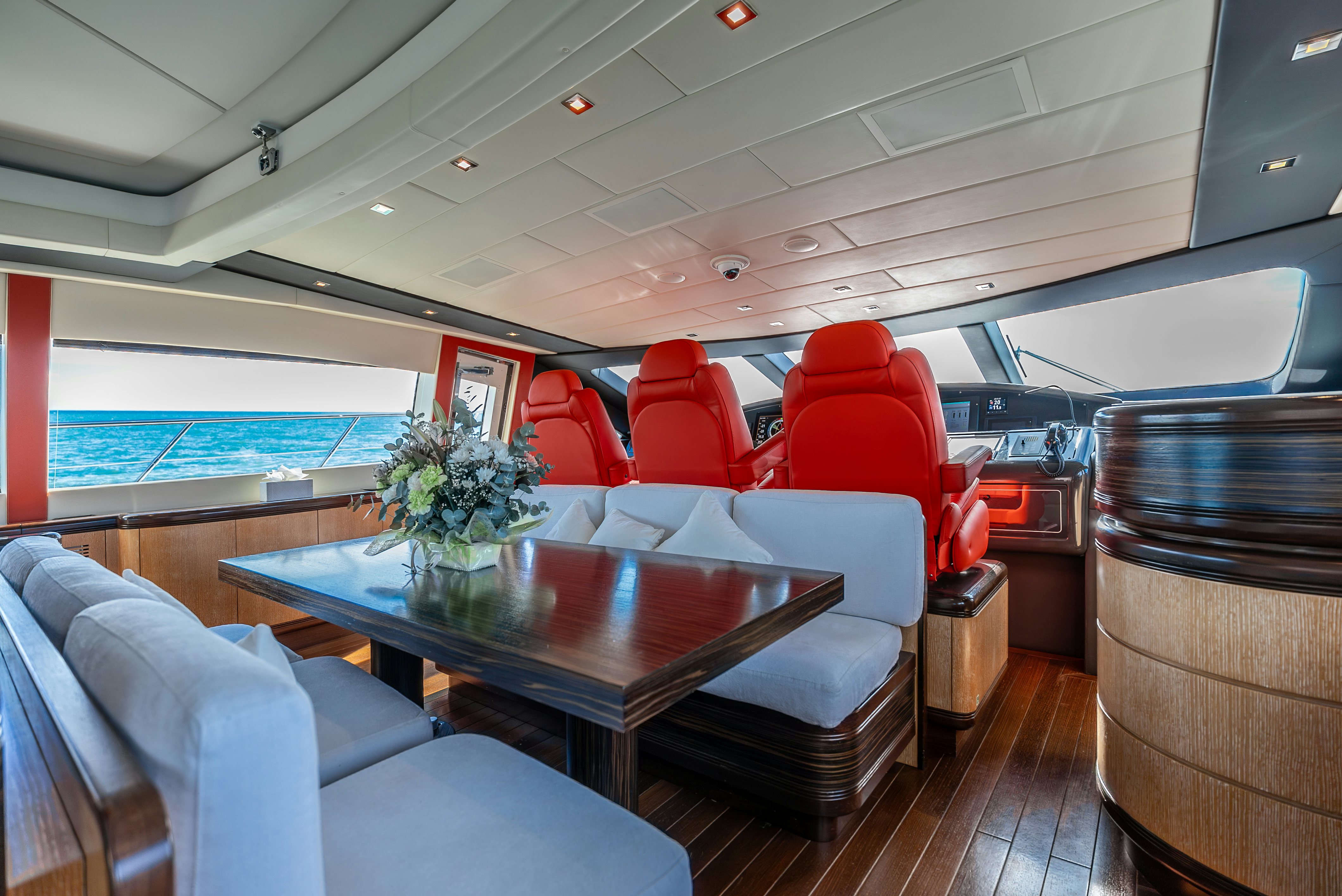 inside of a boat with chairs and tables and a large window aboard GRAZIADIU Yacht for Sale