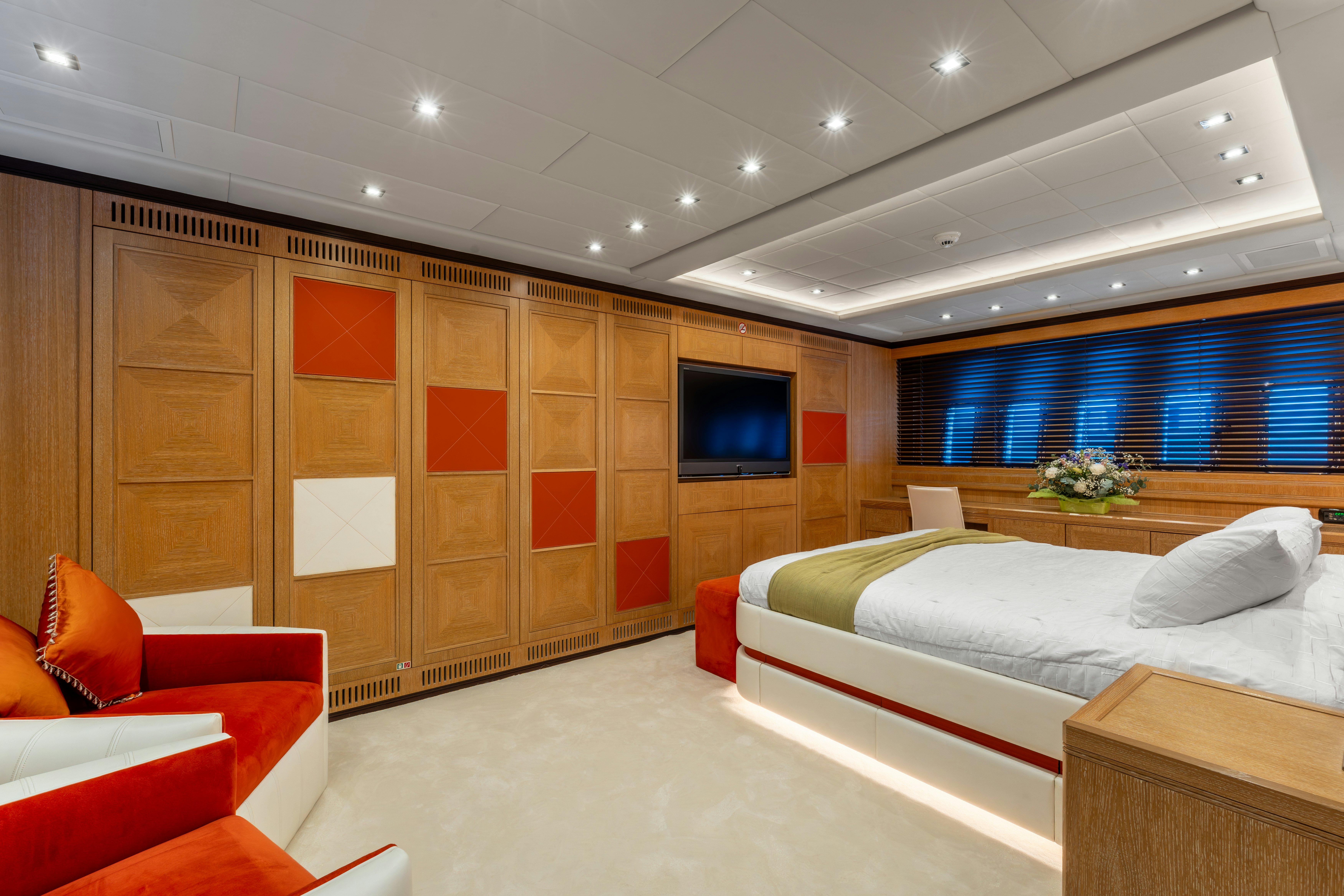 a room with a bed and a tv aboard GRAZIADIU Yacht for Sale