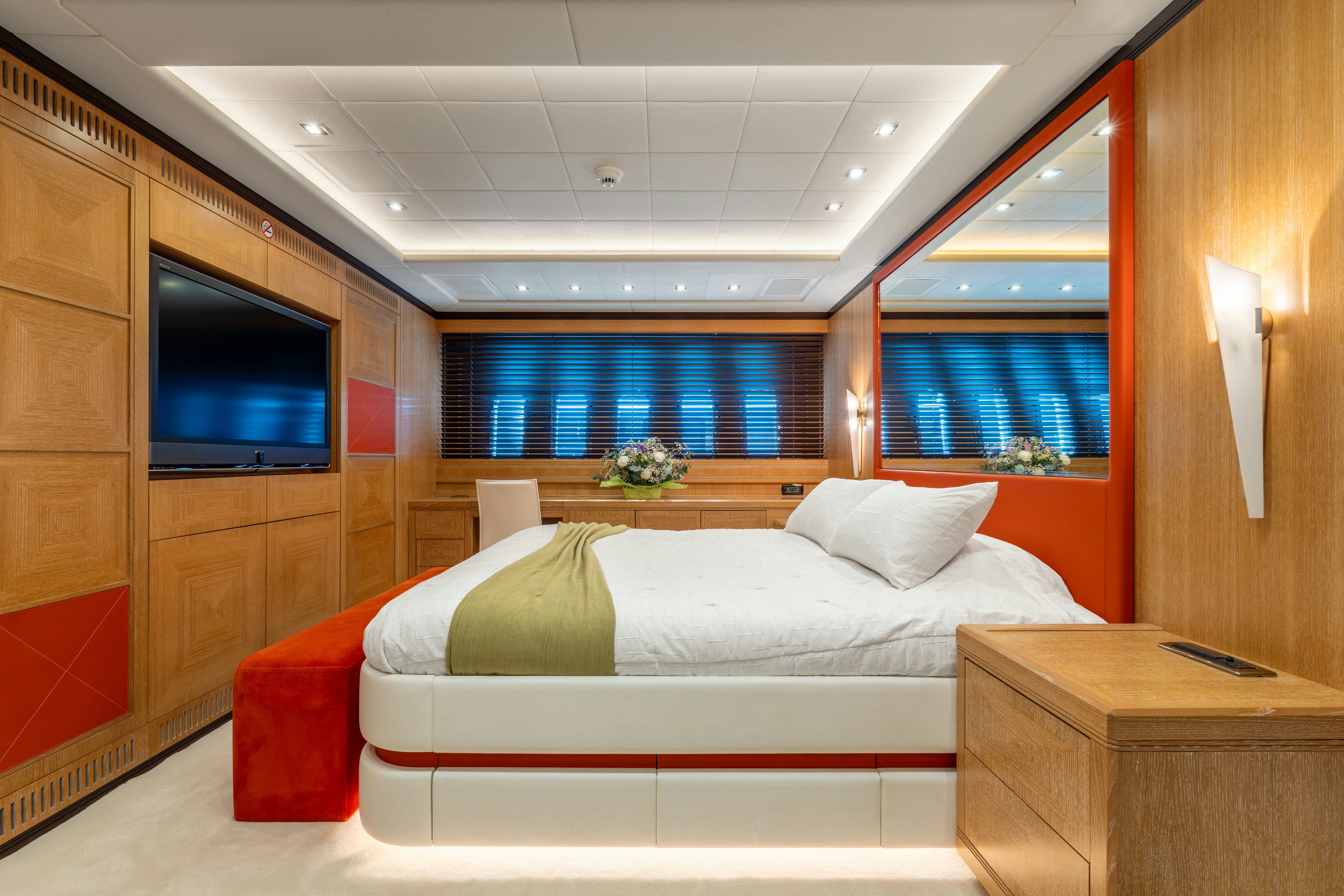 a room with a bed and a tv aboard GRAZIADIU Yacht for Sale
