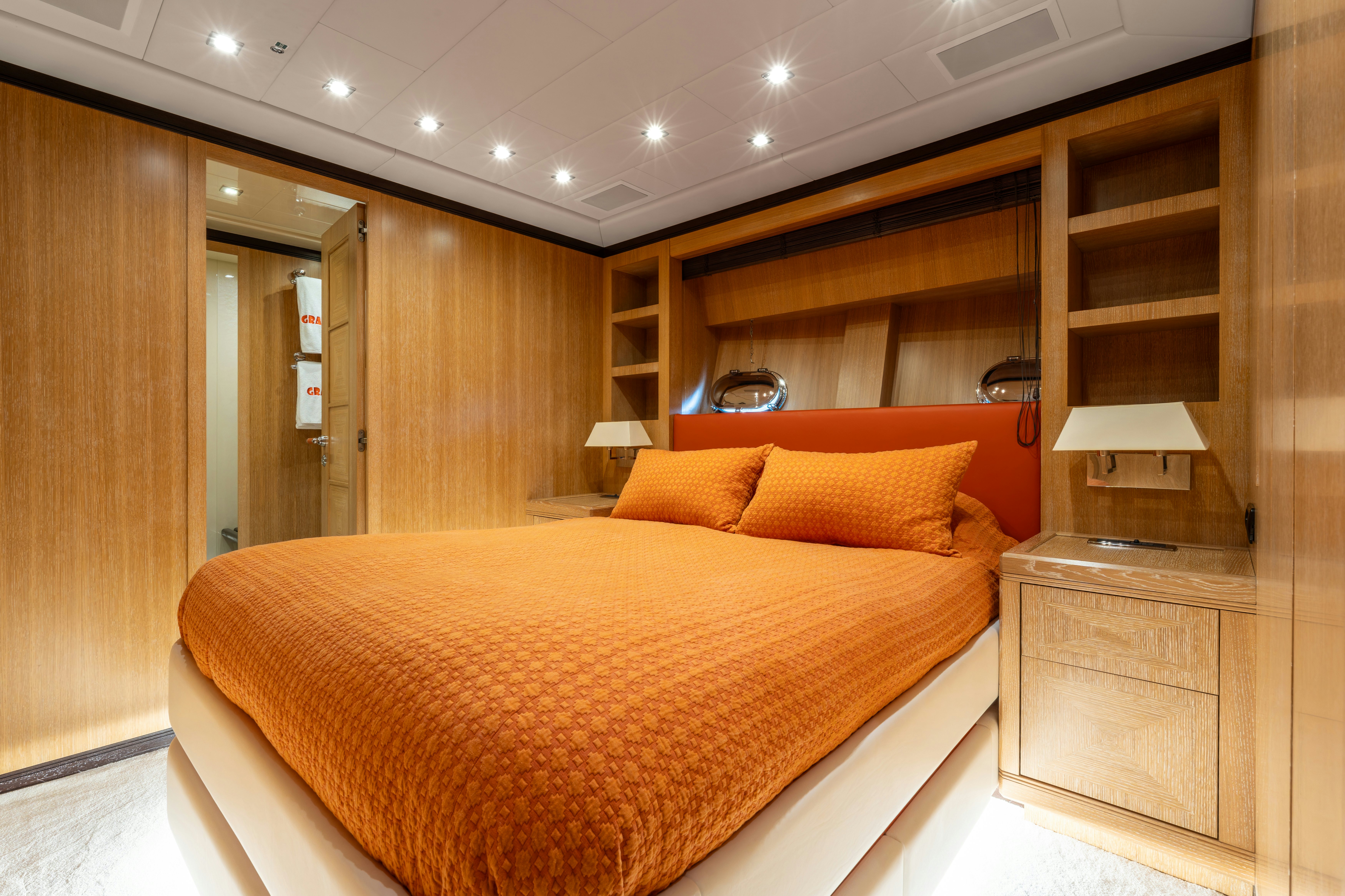 a large bedroom with a large bed aboard GRAZIADIU Yacht for Sale