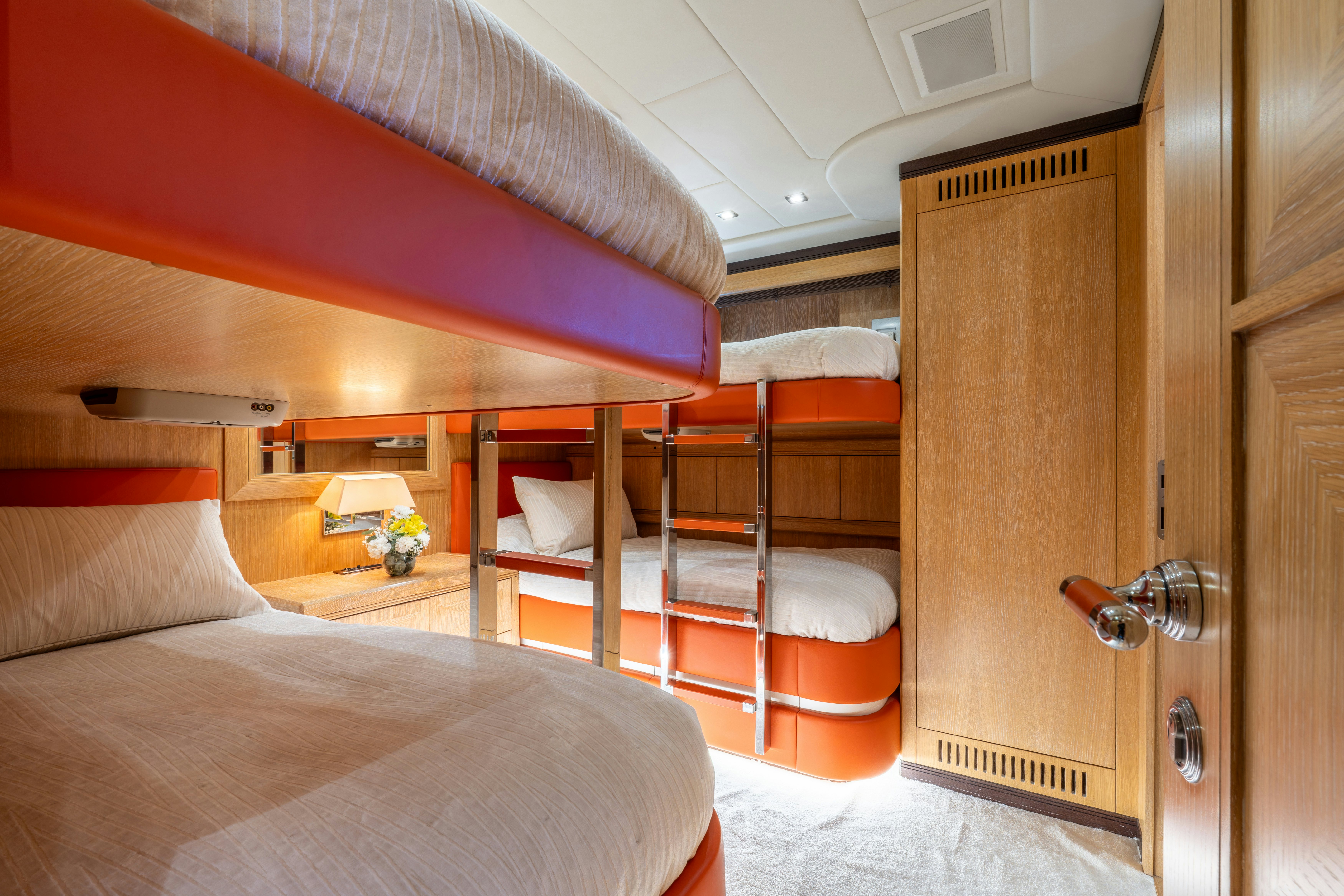 a bedroom with a bunk bed aboard GRAZIADIU Yacht for Sale