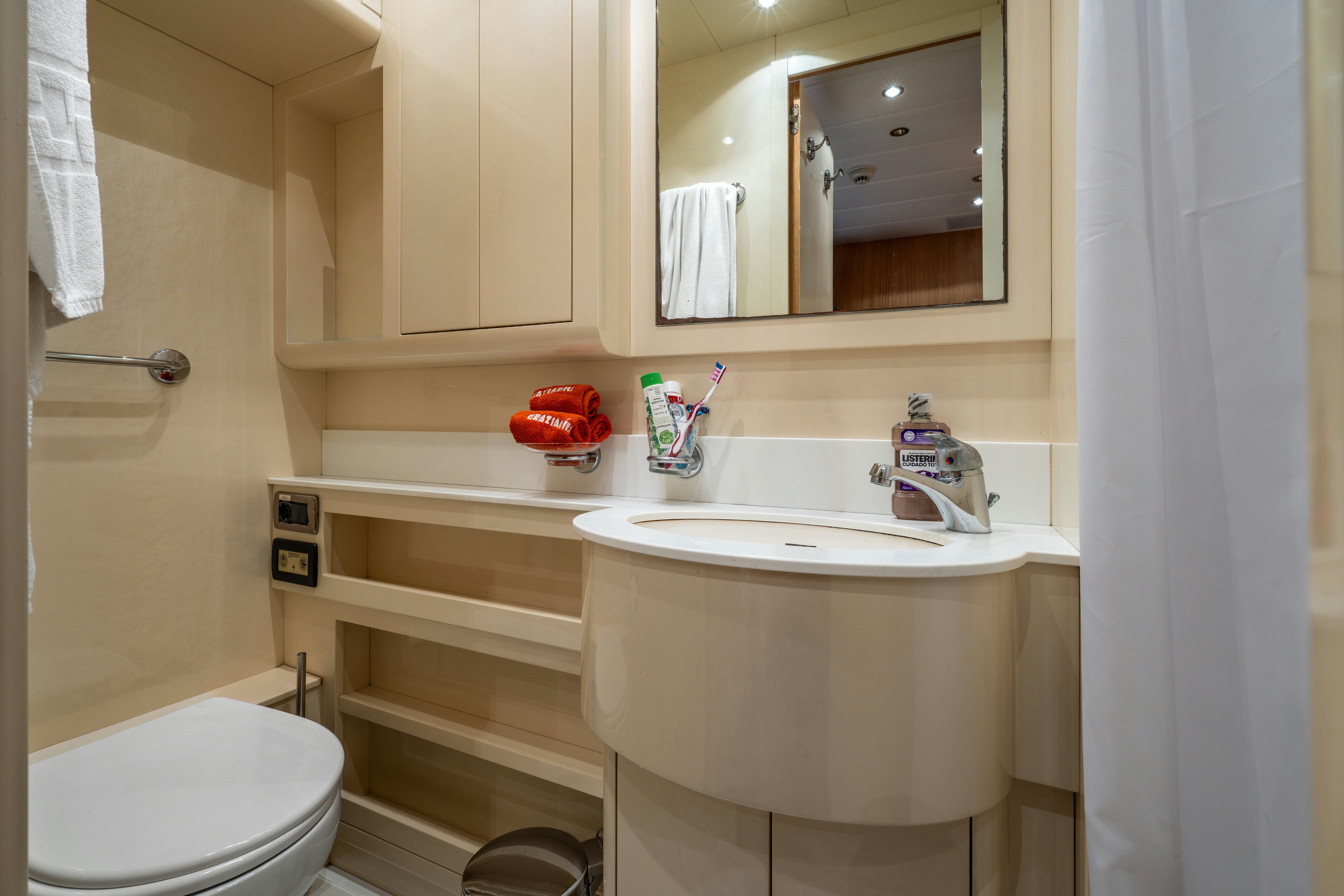 a bathroom with a sink and a toilet aboard GRAZIADIU Yacht for Sale