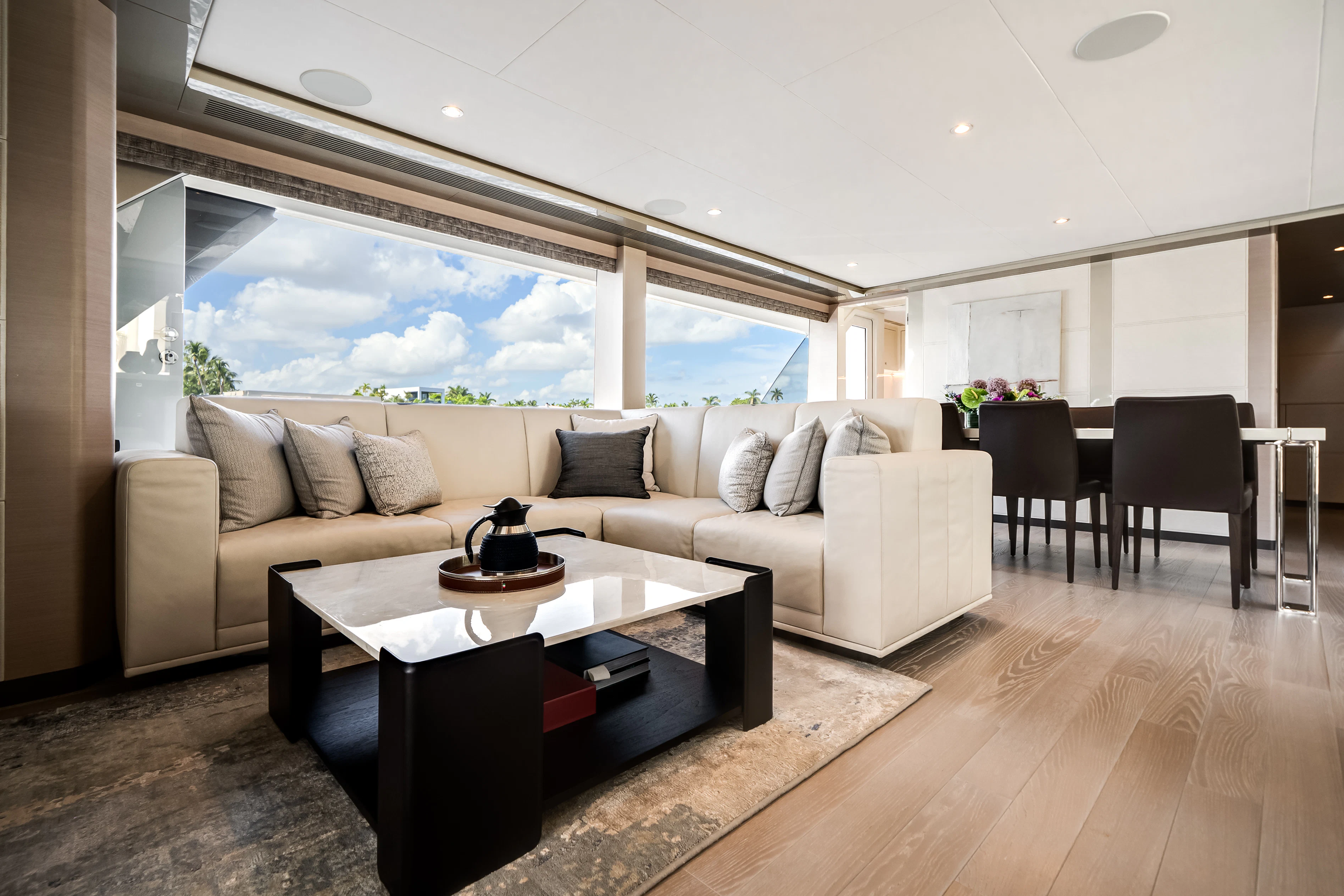 a living room with a large window aboard STILL WATERS Yacht for Sale