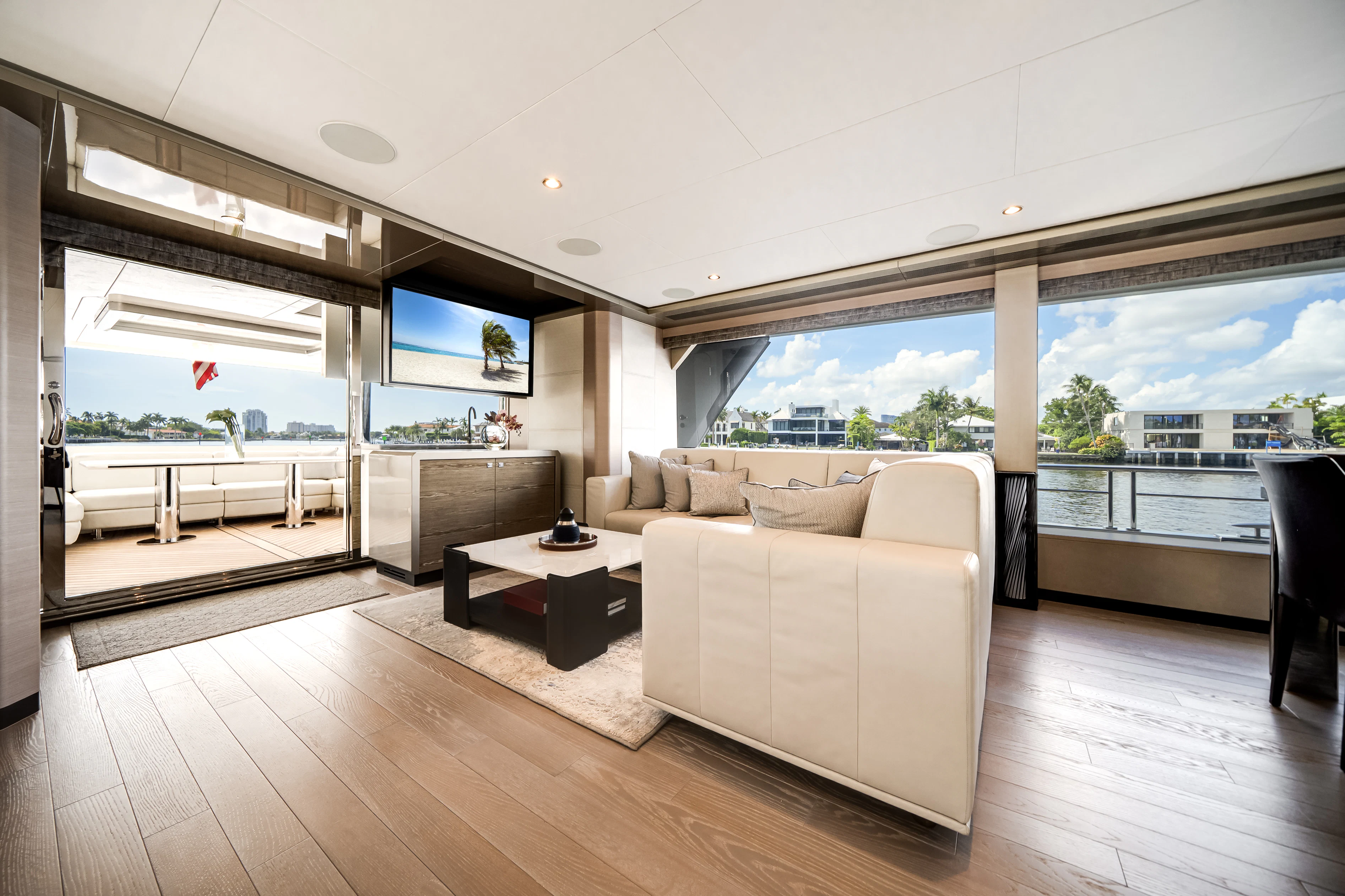 a living room with a large window aboard STILL WATERS Yacht for Sale