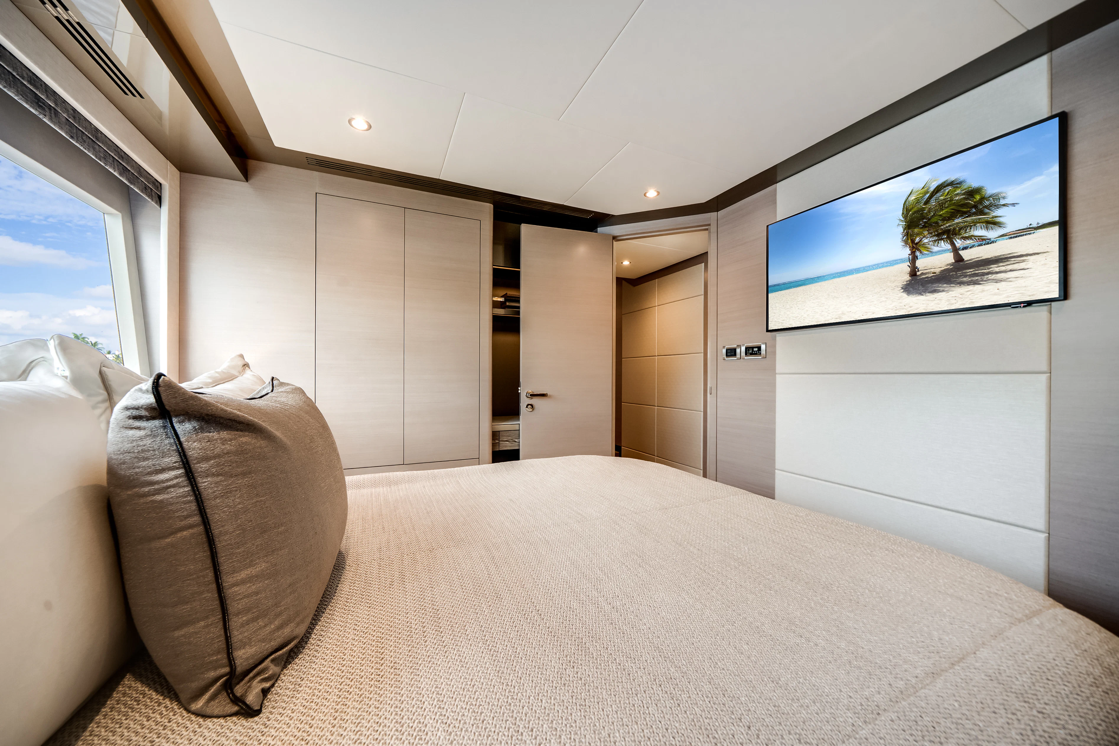 a bed with a pillow and a pillow on it aboard STILL WATERS Yacht for Sale
