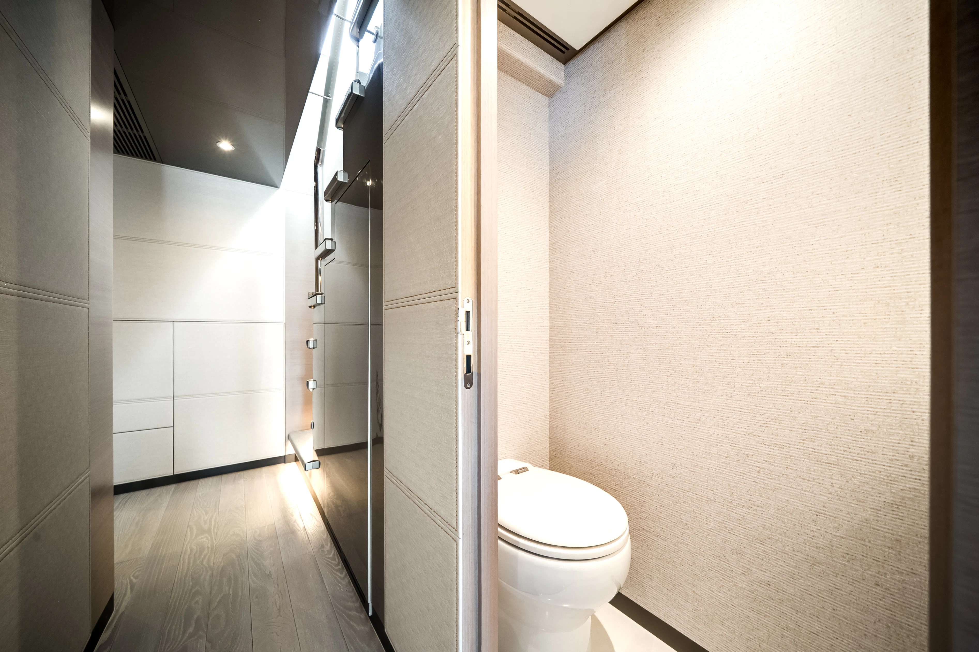 a bathroom with a toilet and a shower aboard STILL WATERS Yacht for Sale