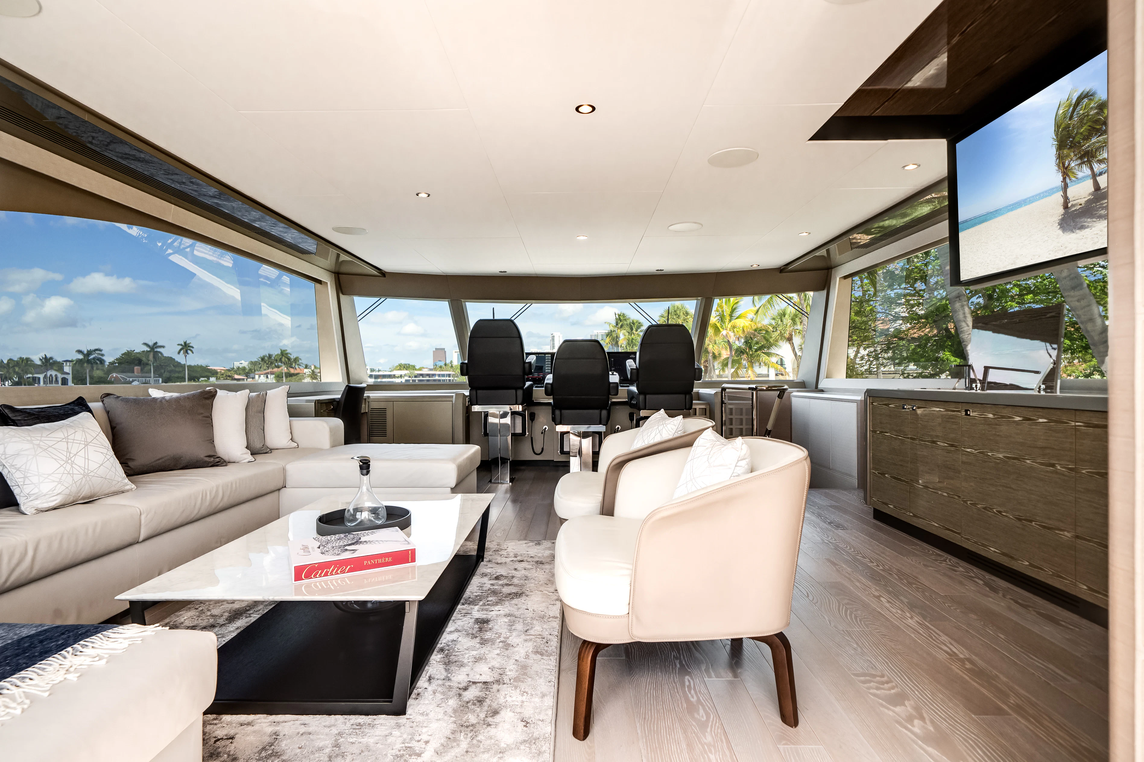 a living room with a large window aboard STILL WATERS Yacht for Sale