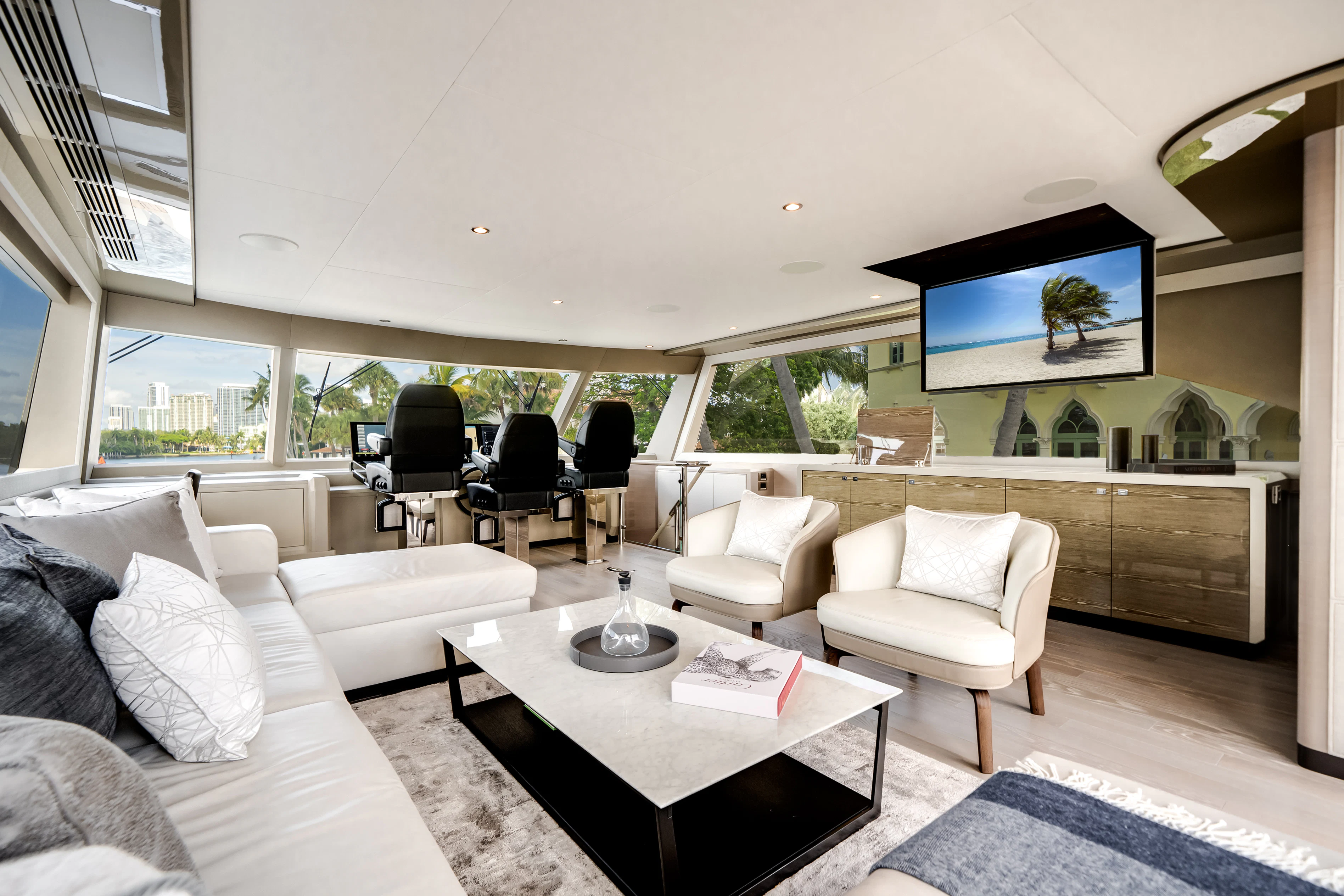 a living room with a large window aboard STILL WATERS Yacht for Sale