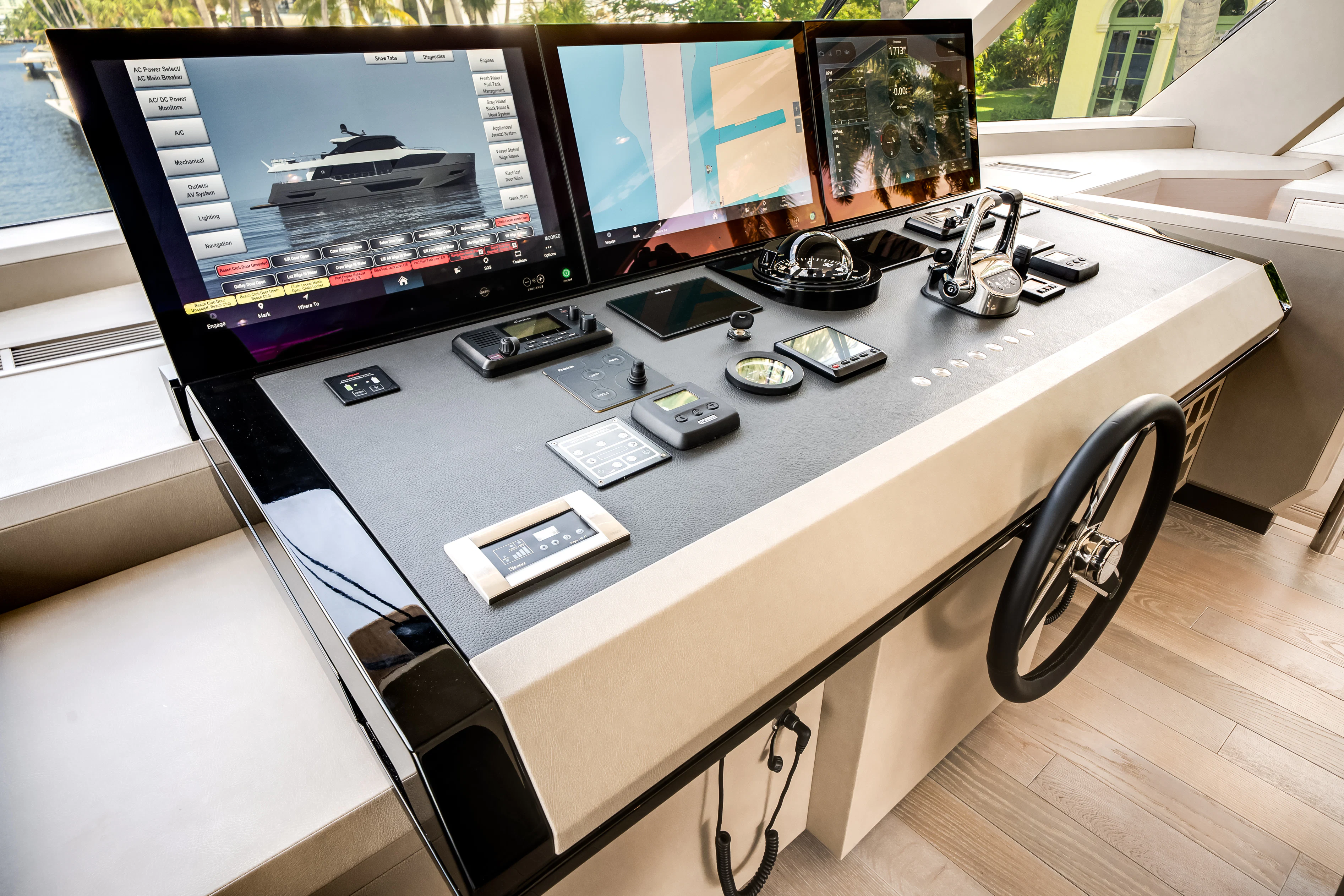 a desk with multiple computer monitors aboard STILL WATERS Yacht for Sale