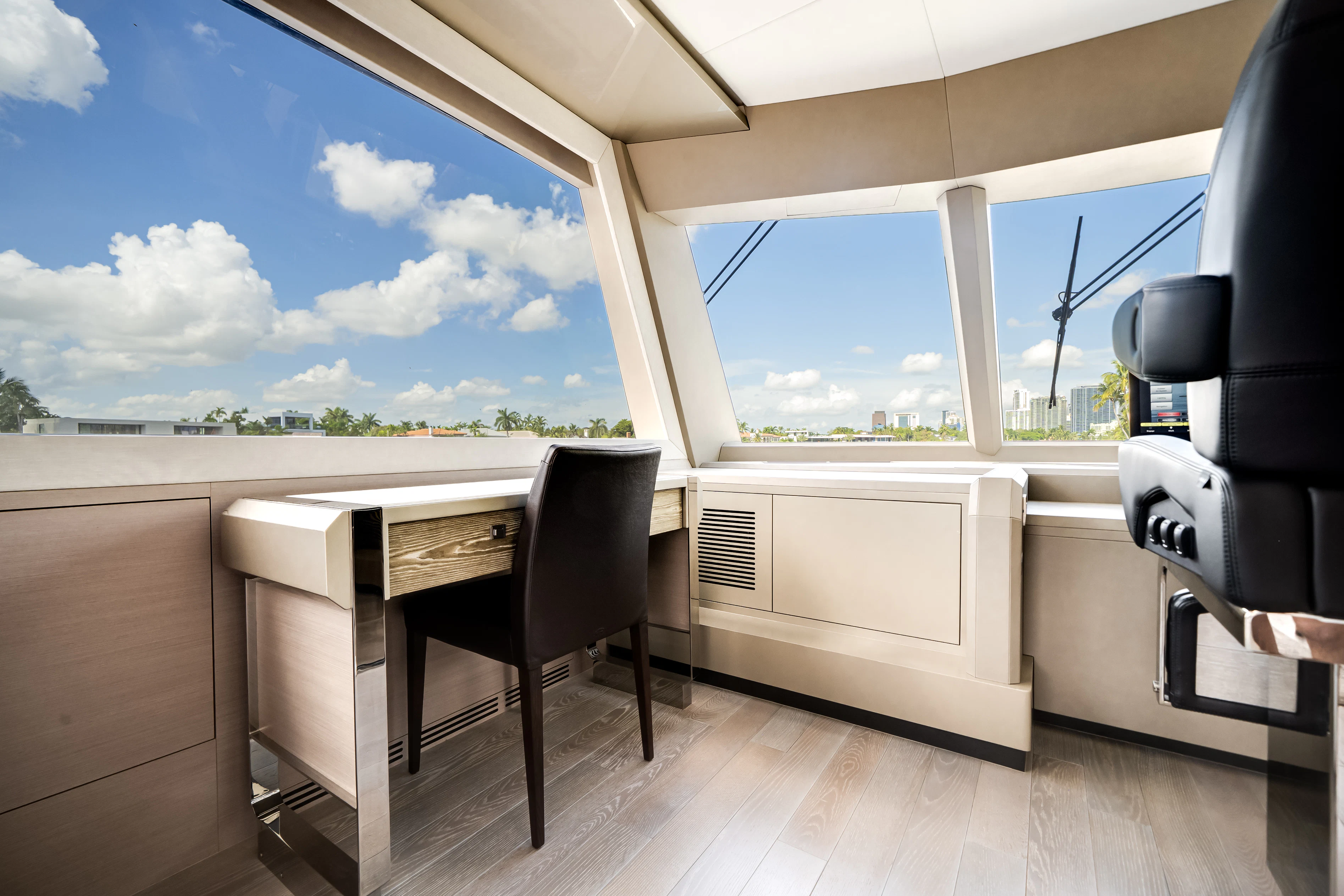 a room with a table and chairs aboard STILL WATERS Yacht for Sale