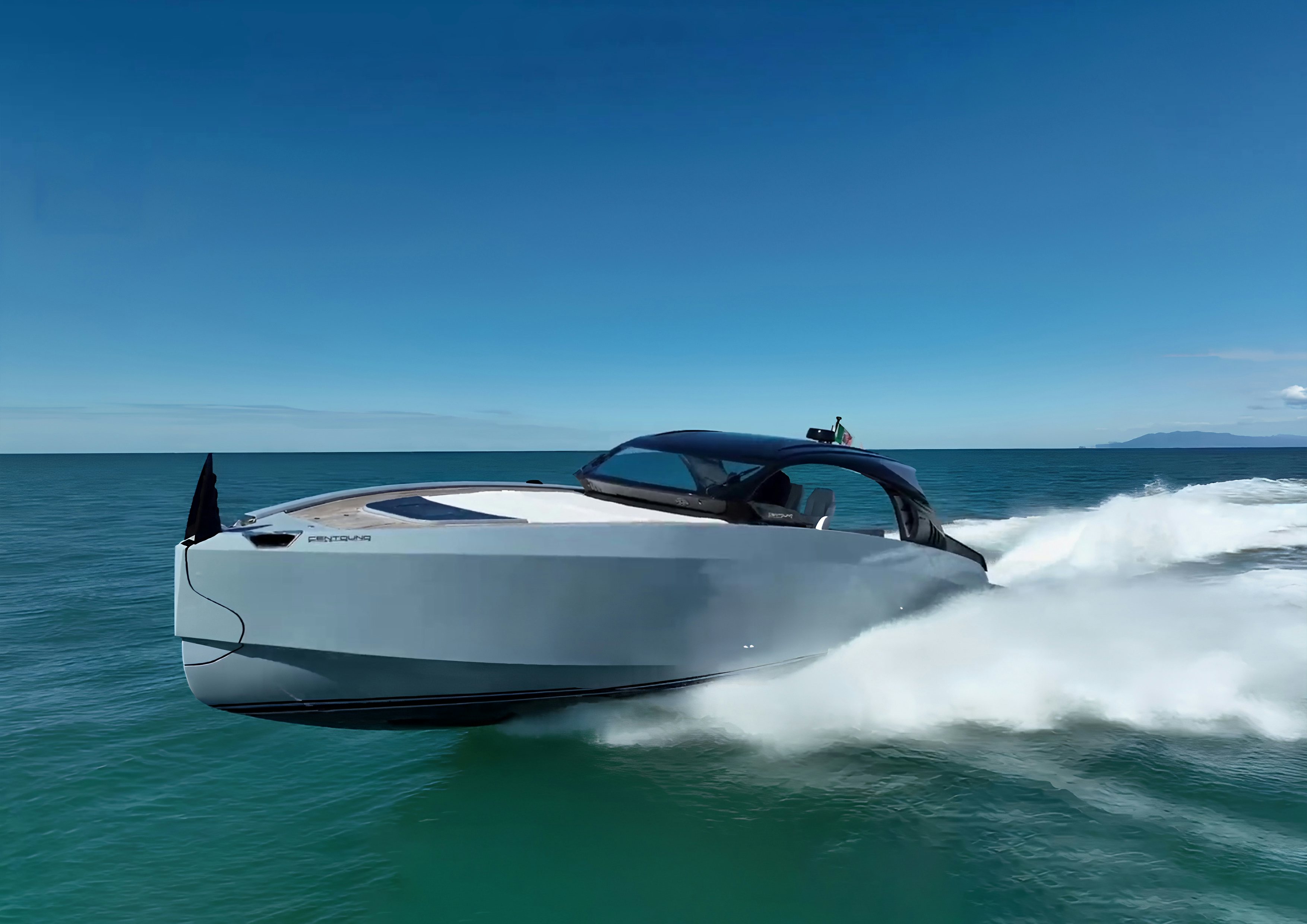 a white sports car driving through the water aboard VESPRO 55 Yacht for Sale