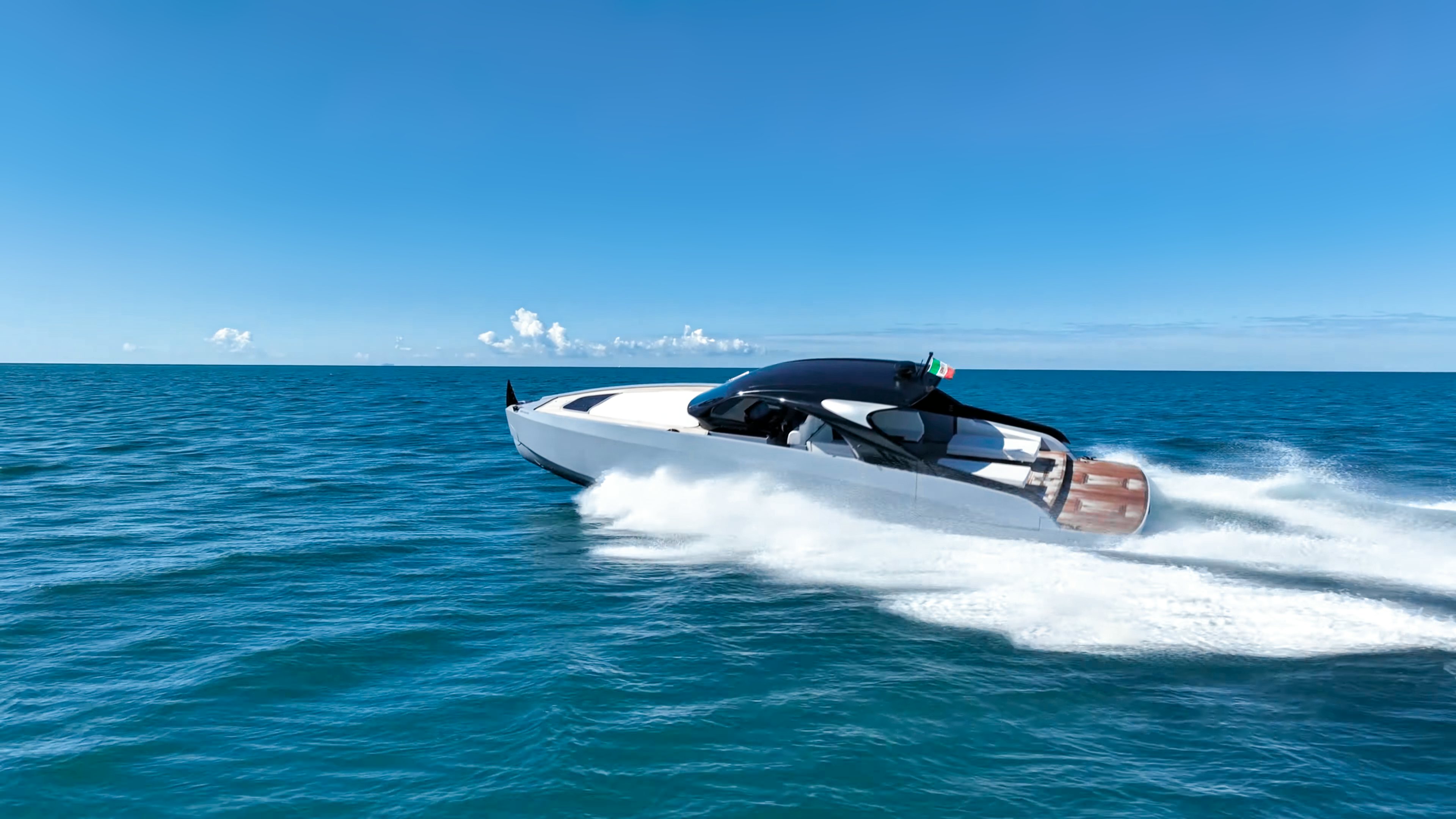 a person in a speedboat aboard VESPRO 55 Yacht for Sale