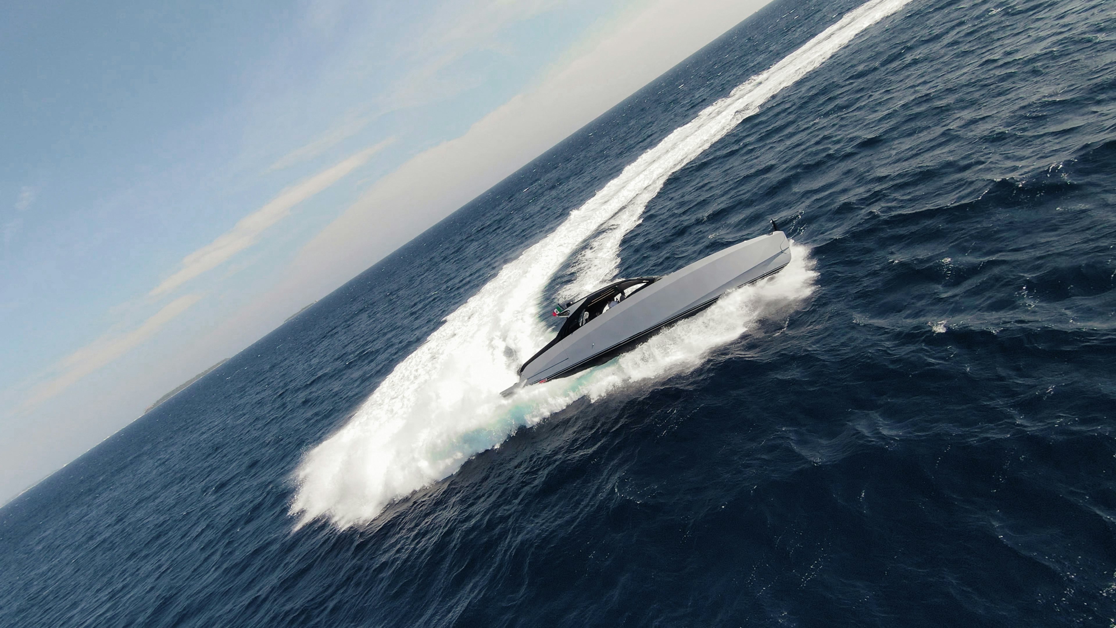 a white boat on the water aboard VESPRO 55 Yacht for Sale