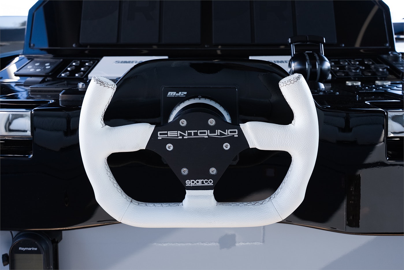 a white headphone on a black surface aboard VESPRO 55 Yacht for Sale