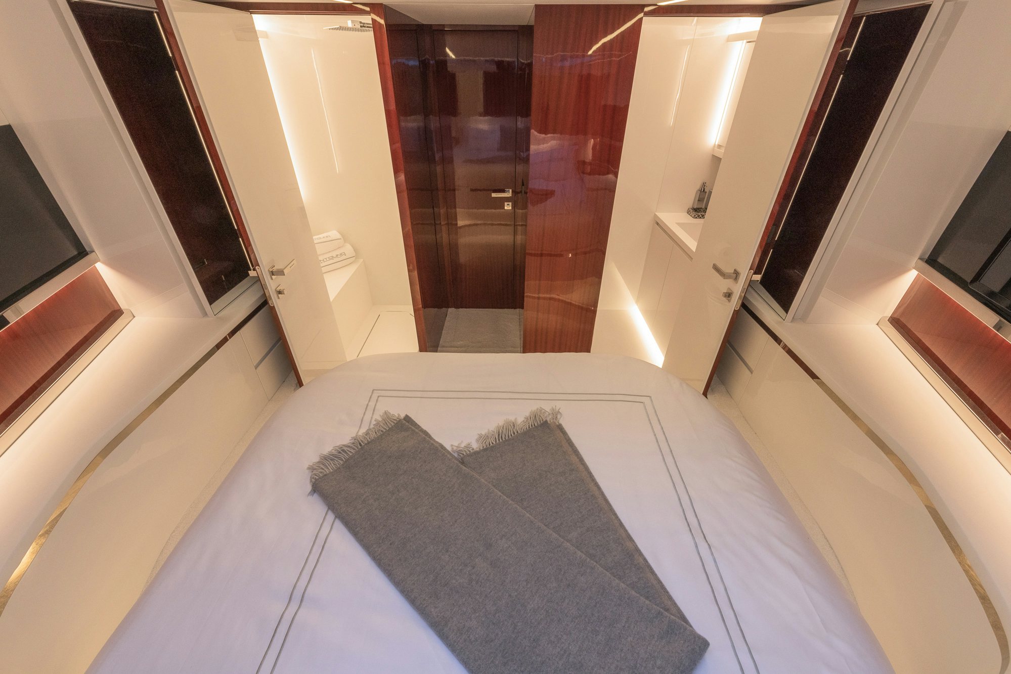 a room with a glass door aboard VESPRO 55 Yacht for Sale