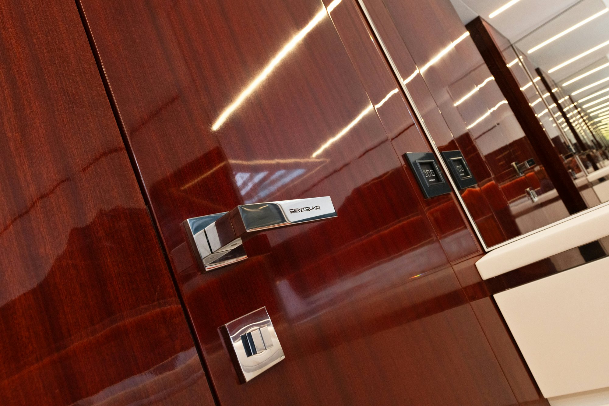 a room with a tv and a window aboard VESPRO 55 Yacht for Sale