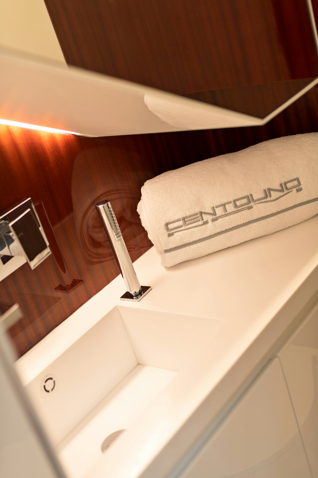 a white bathtub with a towel on it aboard VESPRO 55 Yacht for Sale
