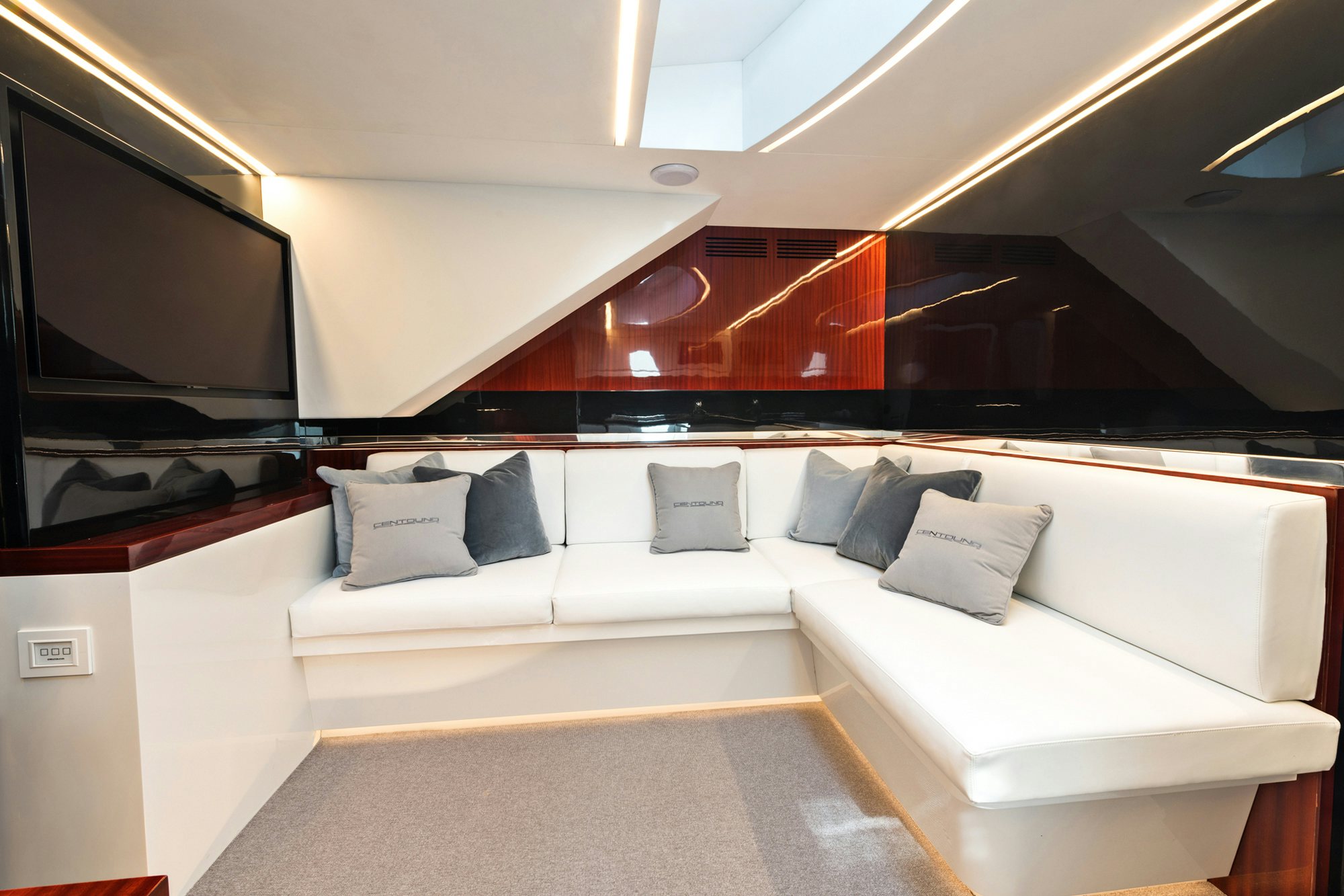 a room with beds and a tv aboard VESPRO 55 Yacht for Sale