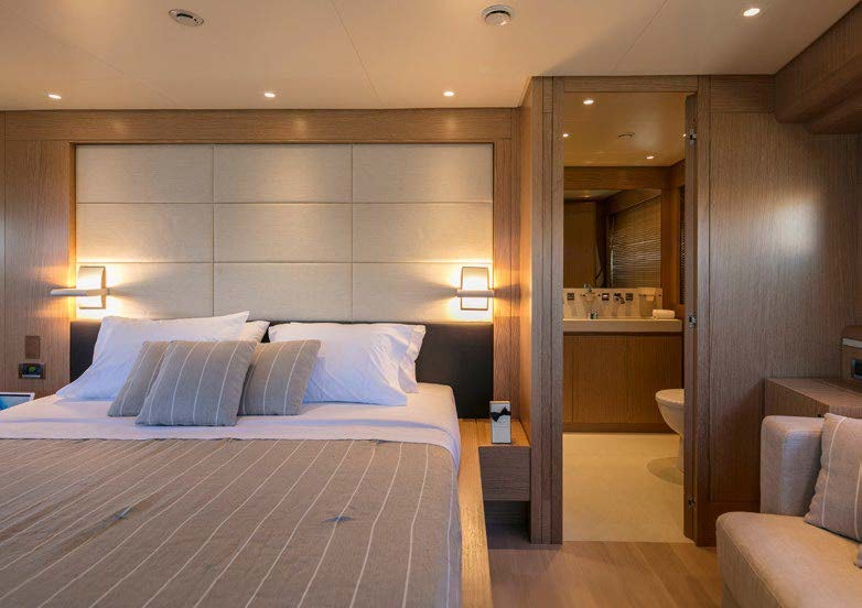 a bed in a hotel room aboard RINI V Yacht for Charter