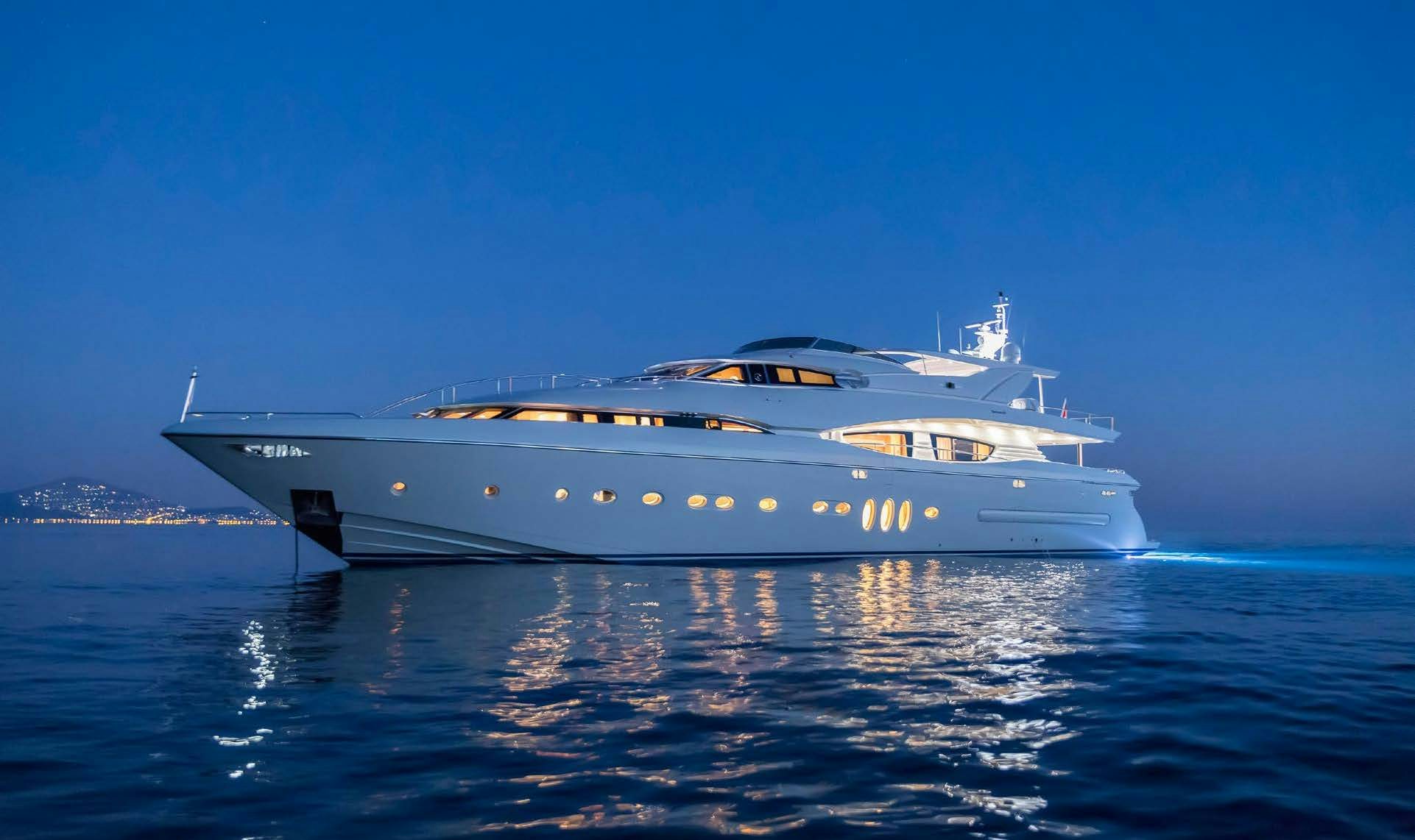 a white yacht in the water aboard RINI V Yacht for Charter