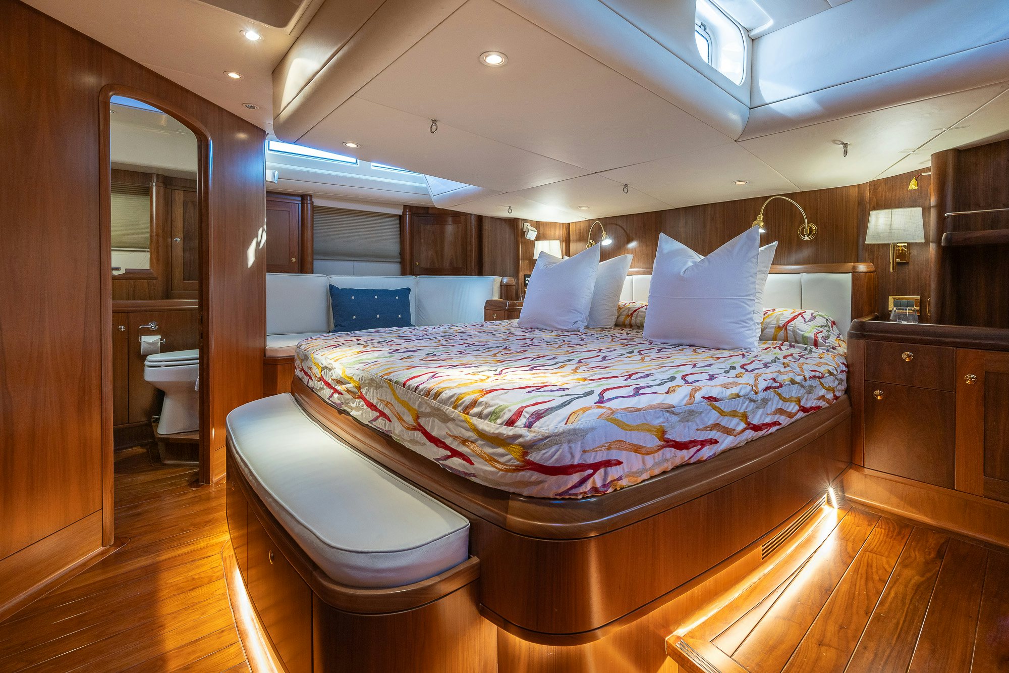 a bed in a room aboard ADESA Yacht for Sale