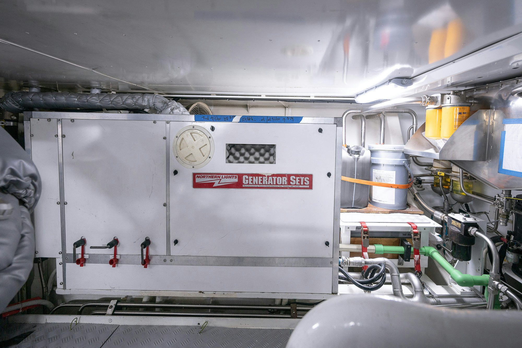 a machine with a large piece of equipment in it aboard ADESA Yacht for Sale