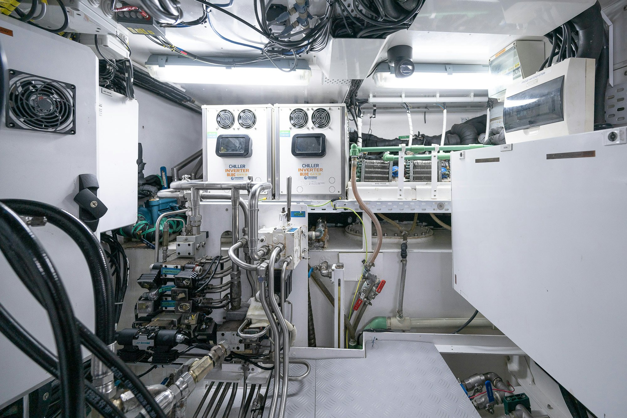 a room with white machines aboard ADESA Yacht for Sale