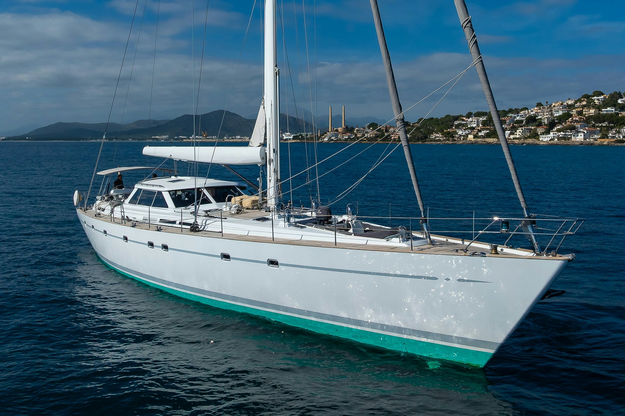a white boat on the water aboard ADESA Yacht for Sale