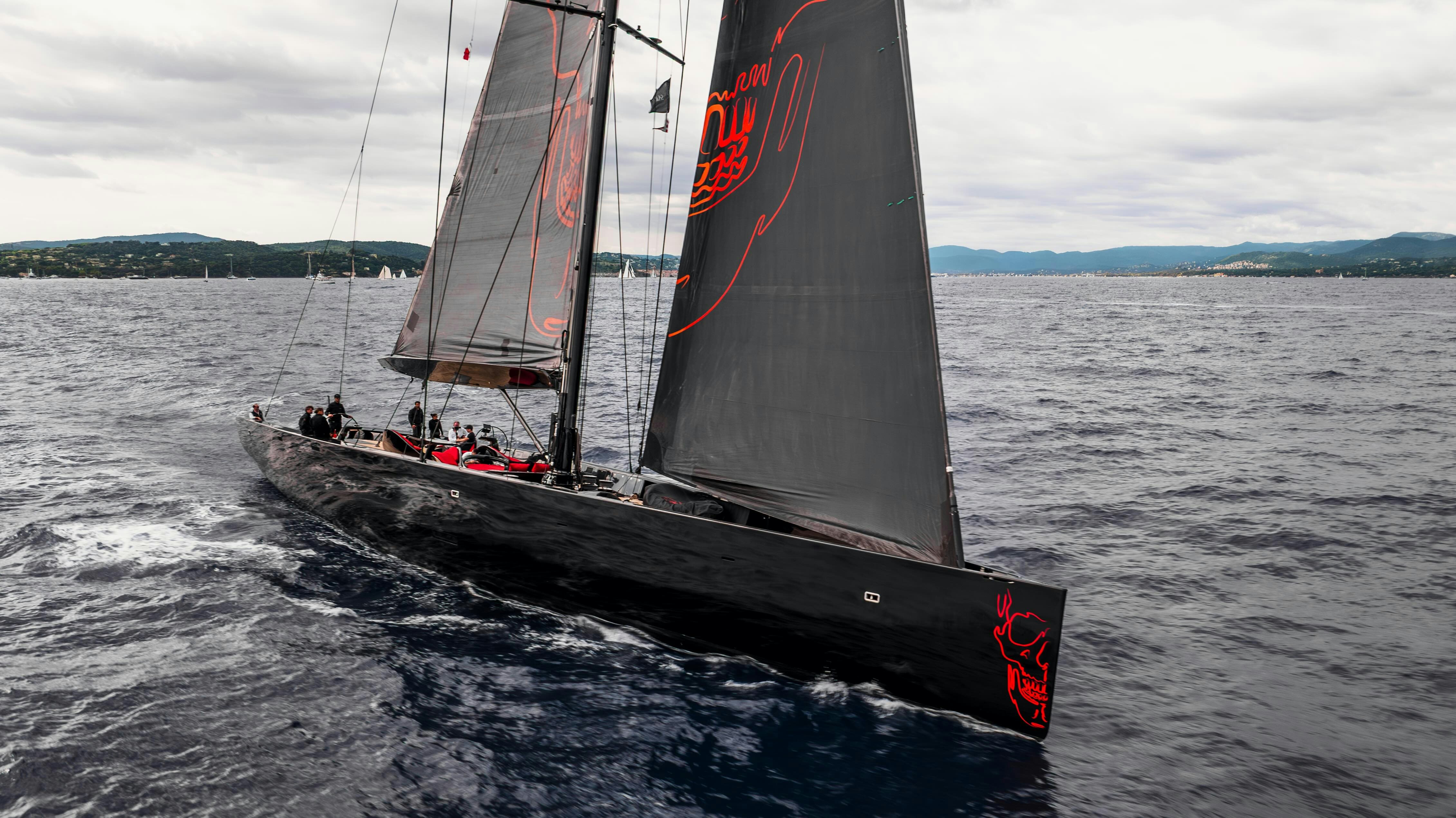a sailboat on the water aboard BLACK SAILS Yacht for Sale