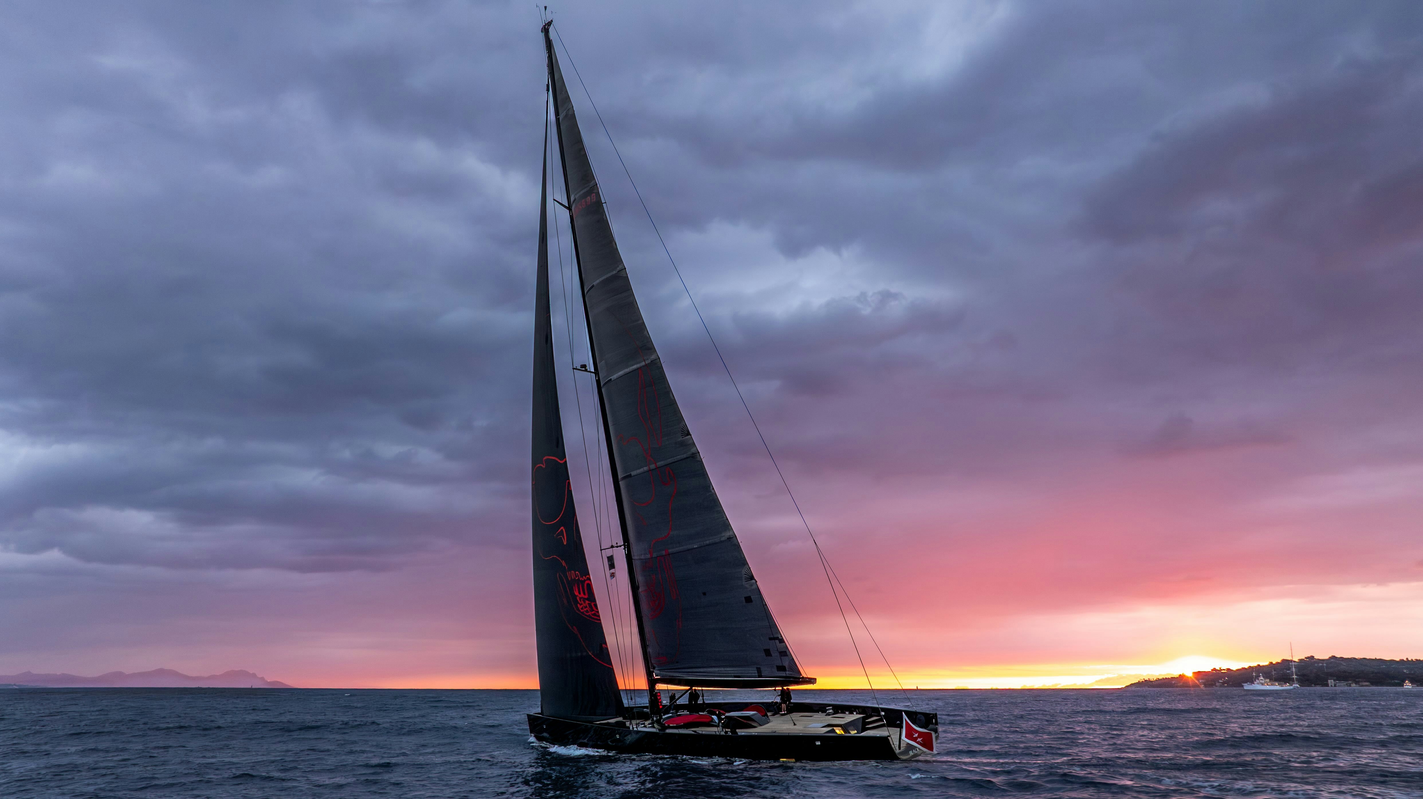 a sailboat on the water aboard BLACK SAILS Yacht for Sale